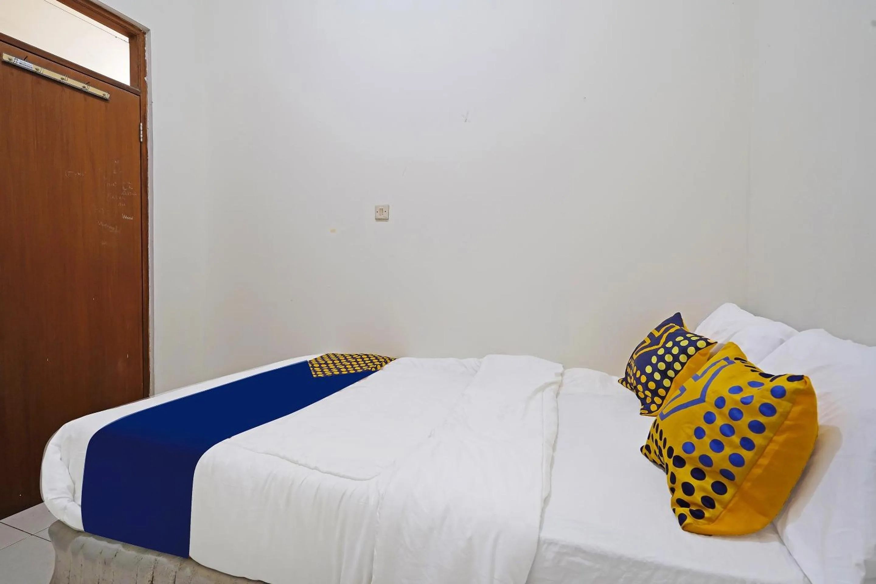 Bedroom in SPOT ON 91394 Pondok Paskal Syariah