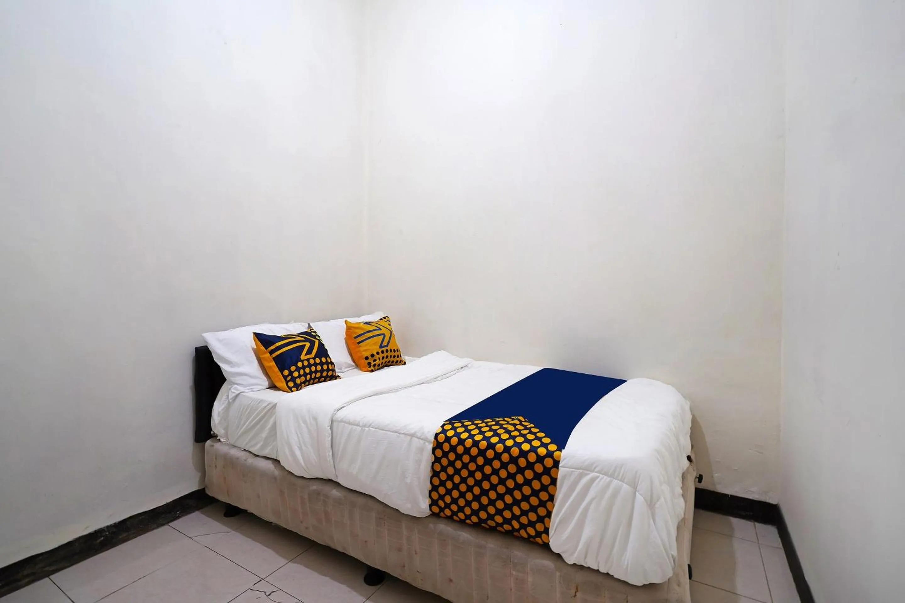 Bedroom in SPOT ON 91394 Pondok Paskal Syariah