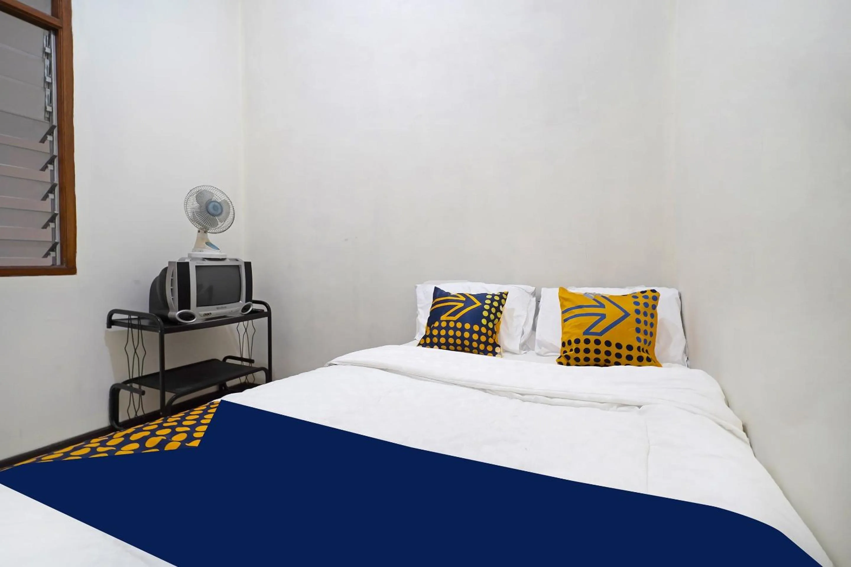 Bedroom in SPOT ON 91394 Pondok Paskal Syariah