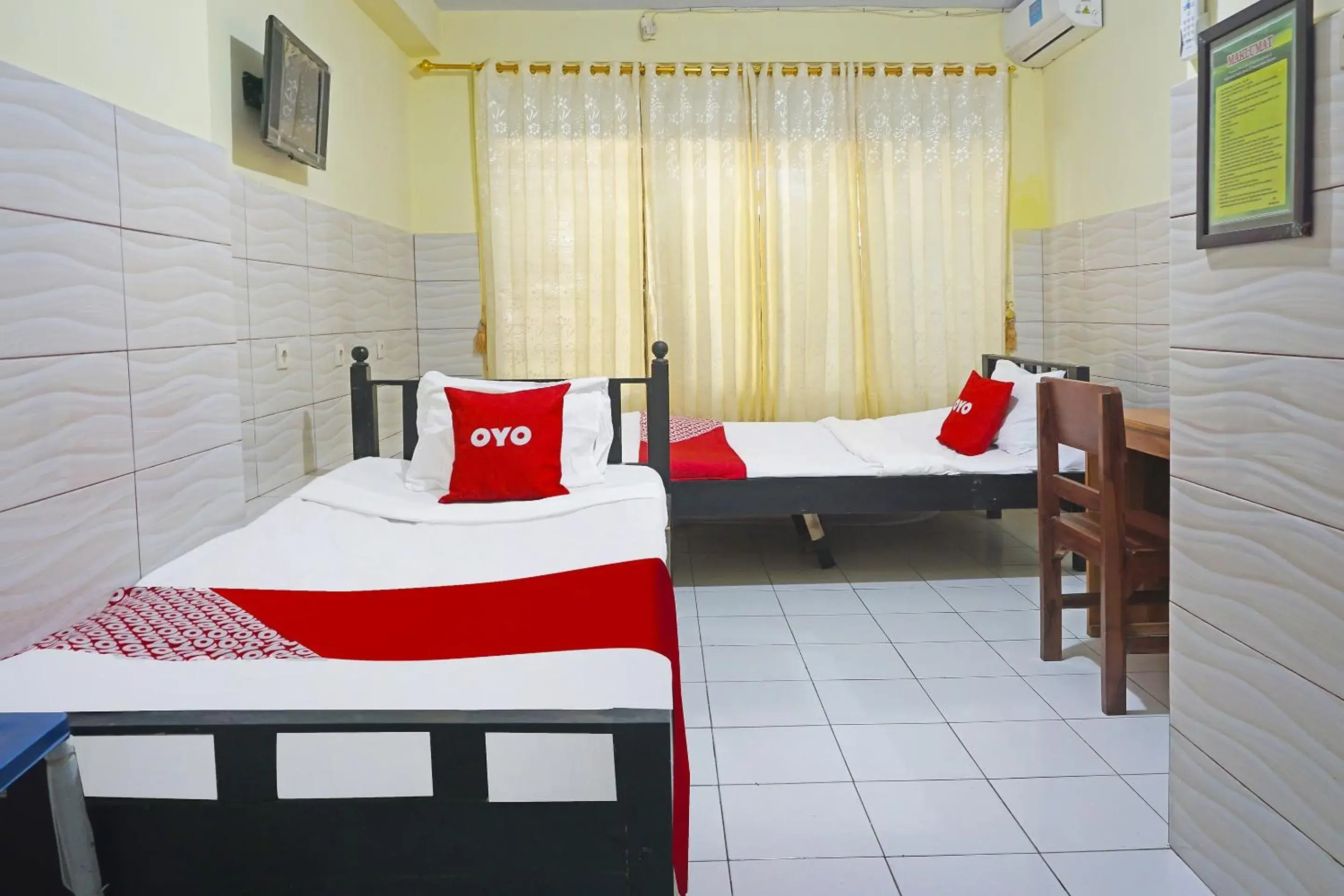 Deluxe Twin Room - single occupancy in Hotel O Putih Mulia Homestay Syariah Deluxe Twin Room - single occupancy in Hotel O Putih Mulia Homestay Syariah