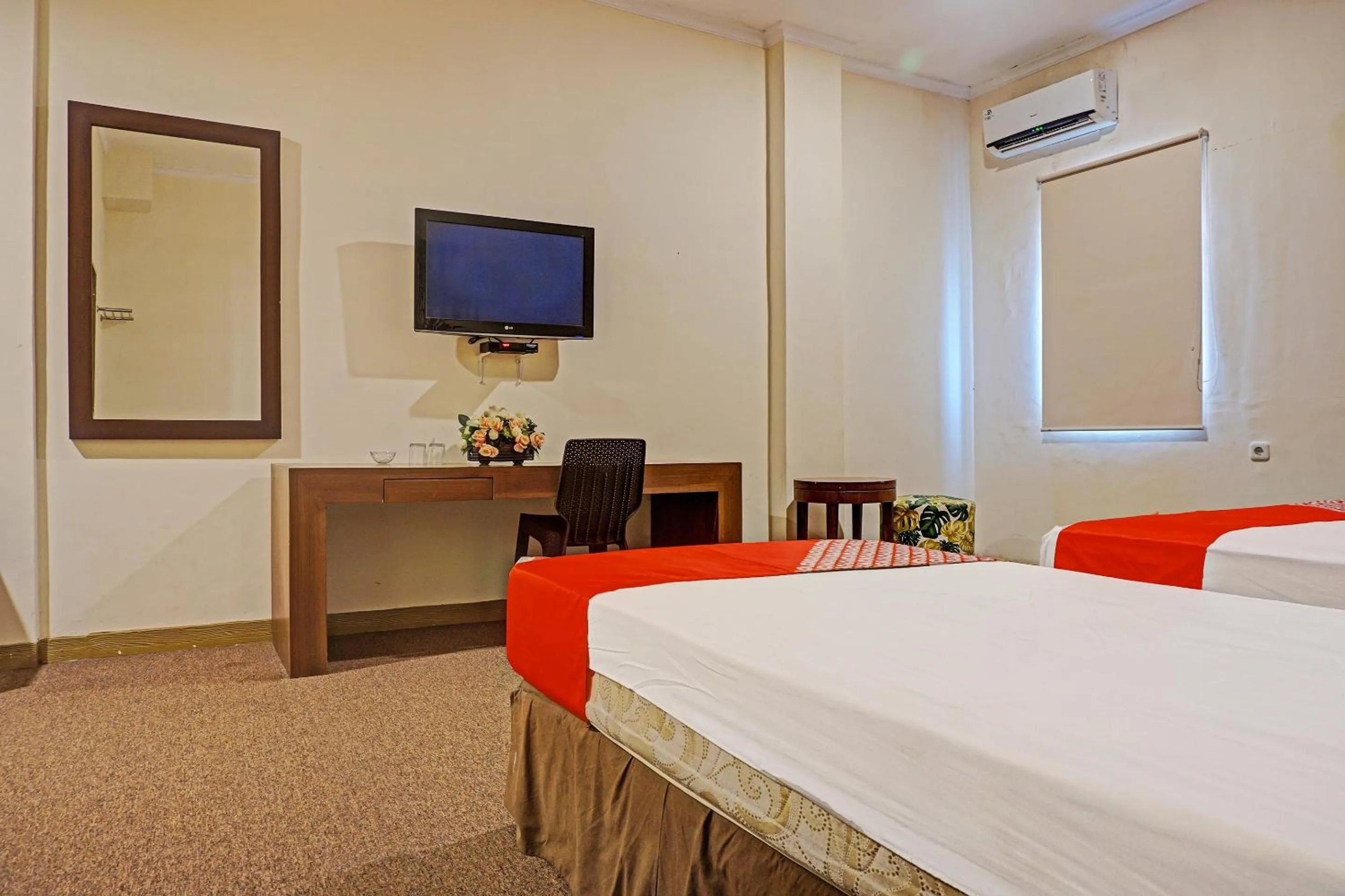 Bedroom in Collection O 91414 Hotel Marina Beach