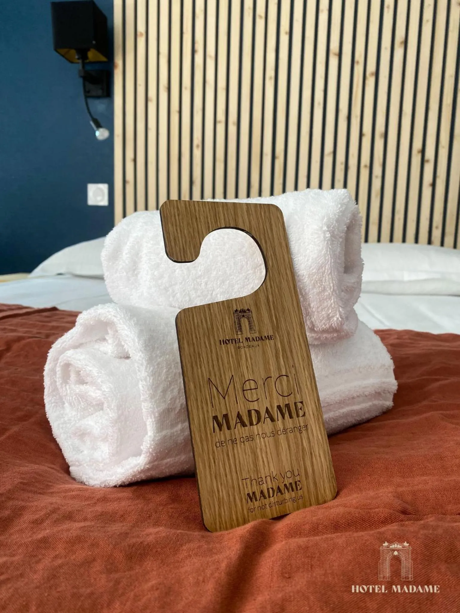 towels, Bed in Hôtel Madame