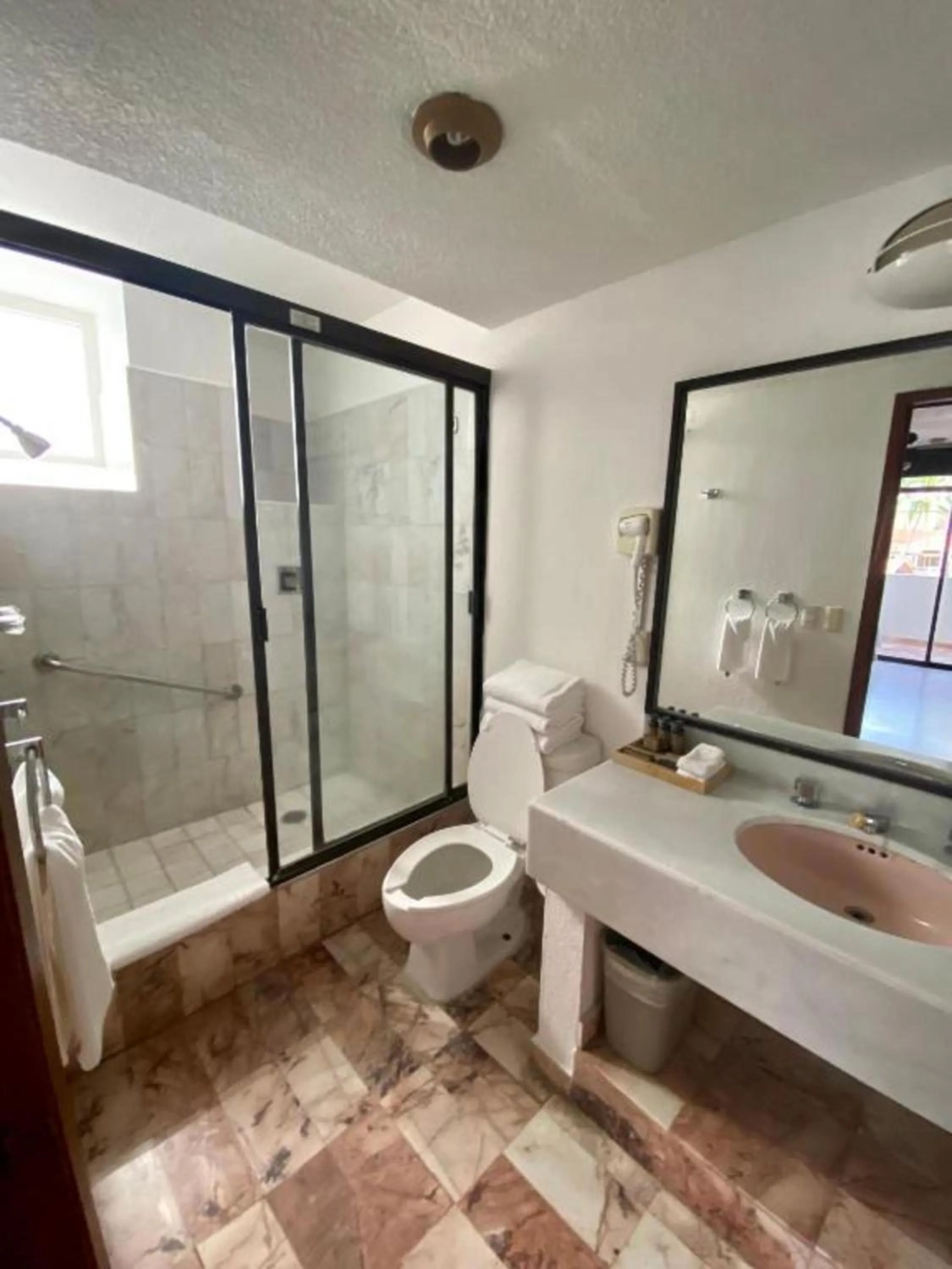 Bathroom in Costa Sur Resort by VRHost