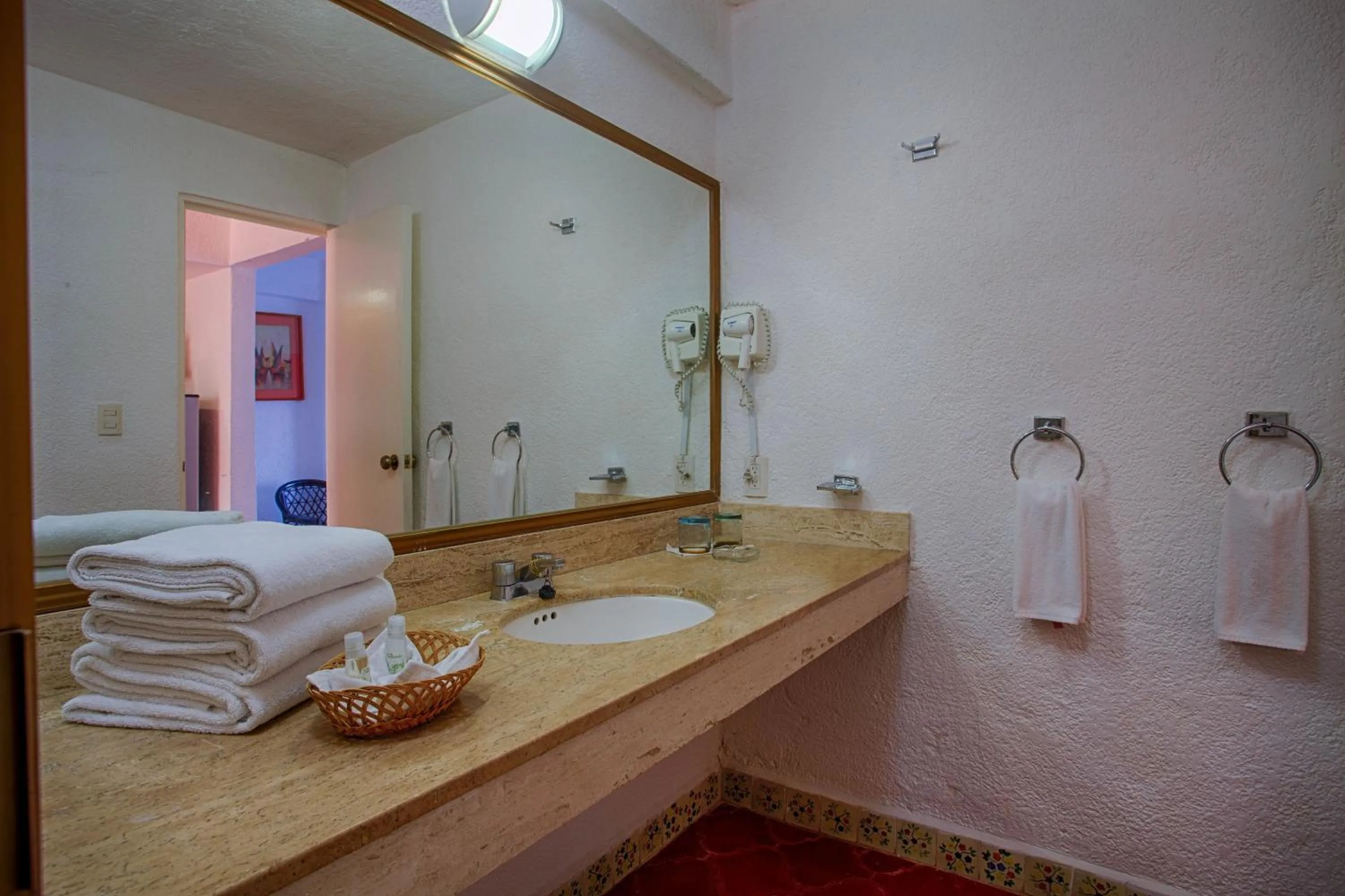 Bathroom in Costa Sur Resort by VRHost