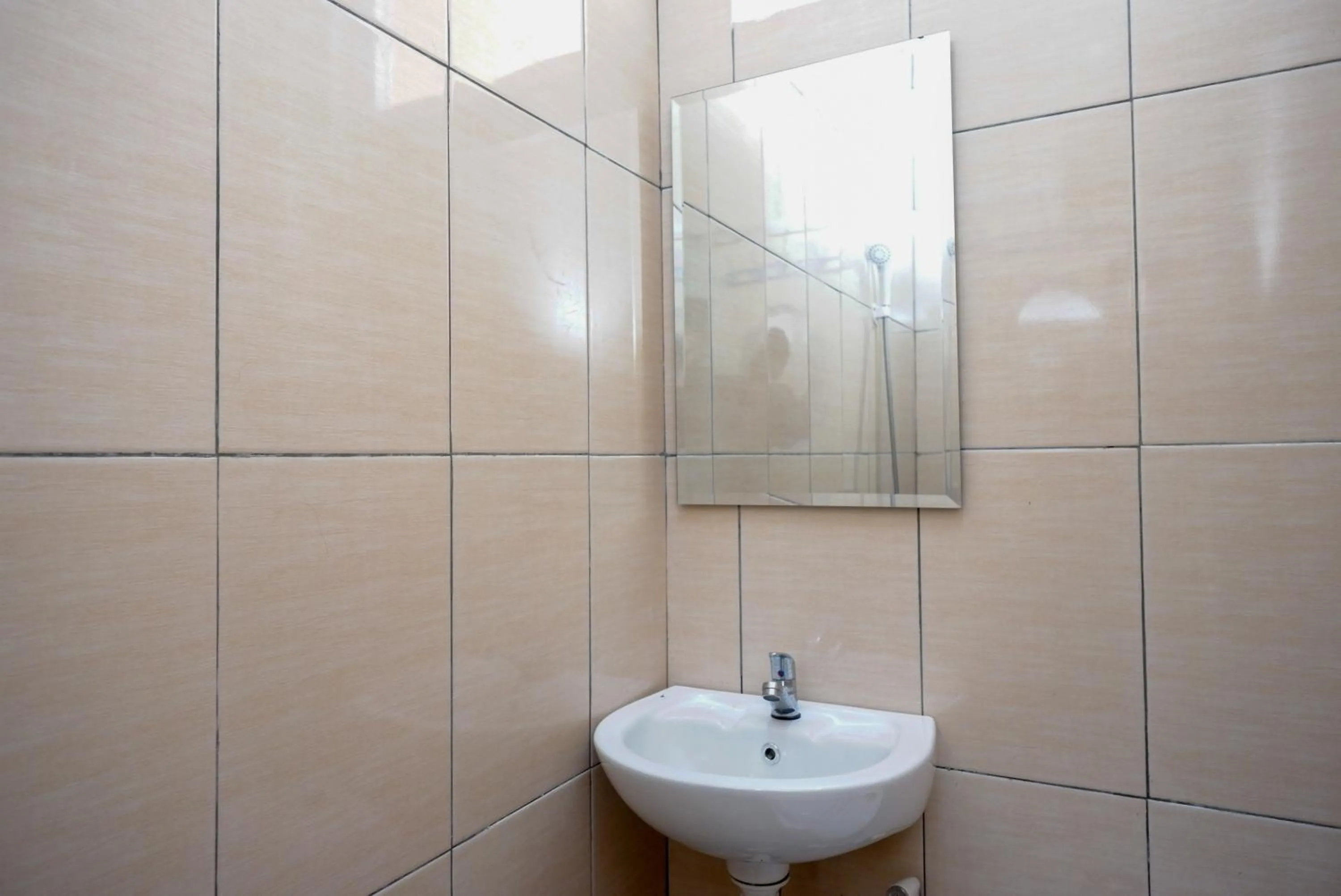 Bathroom in Urbanview Hotel Mountain Palace Kopeng