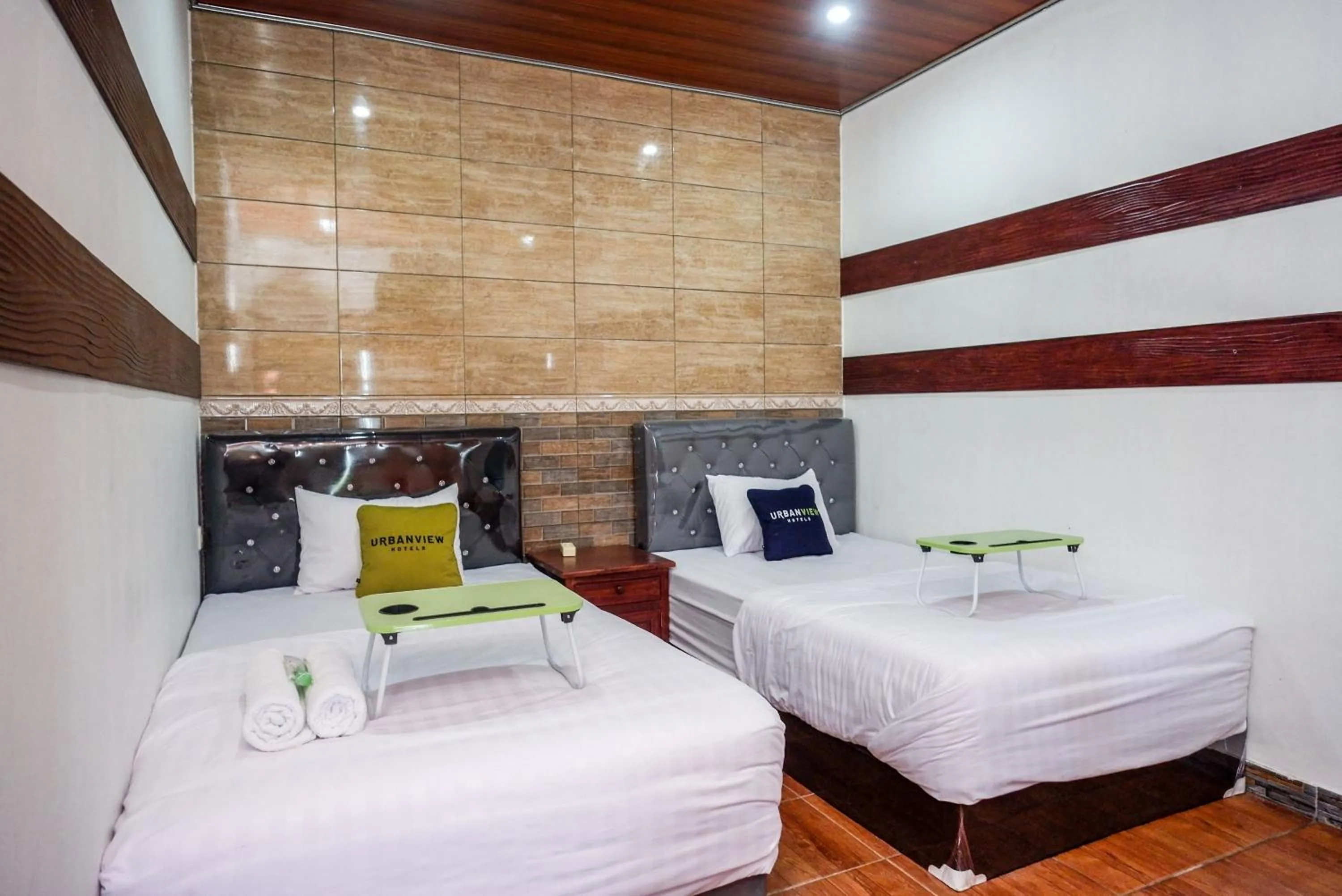 Bedroom, Bed in Urbanview Hotel Mountain Palace Kopeng