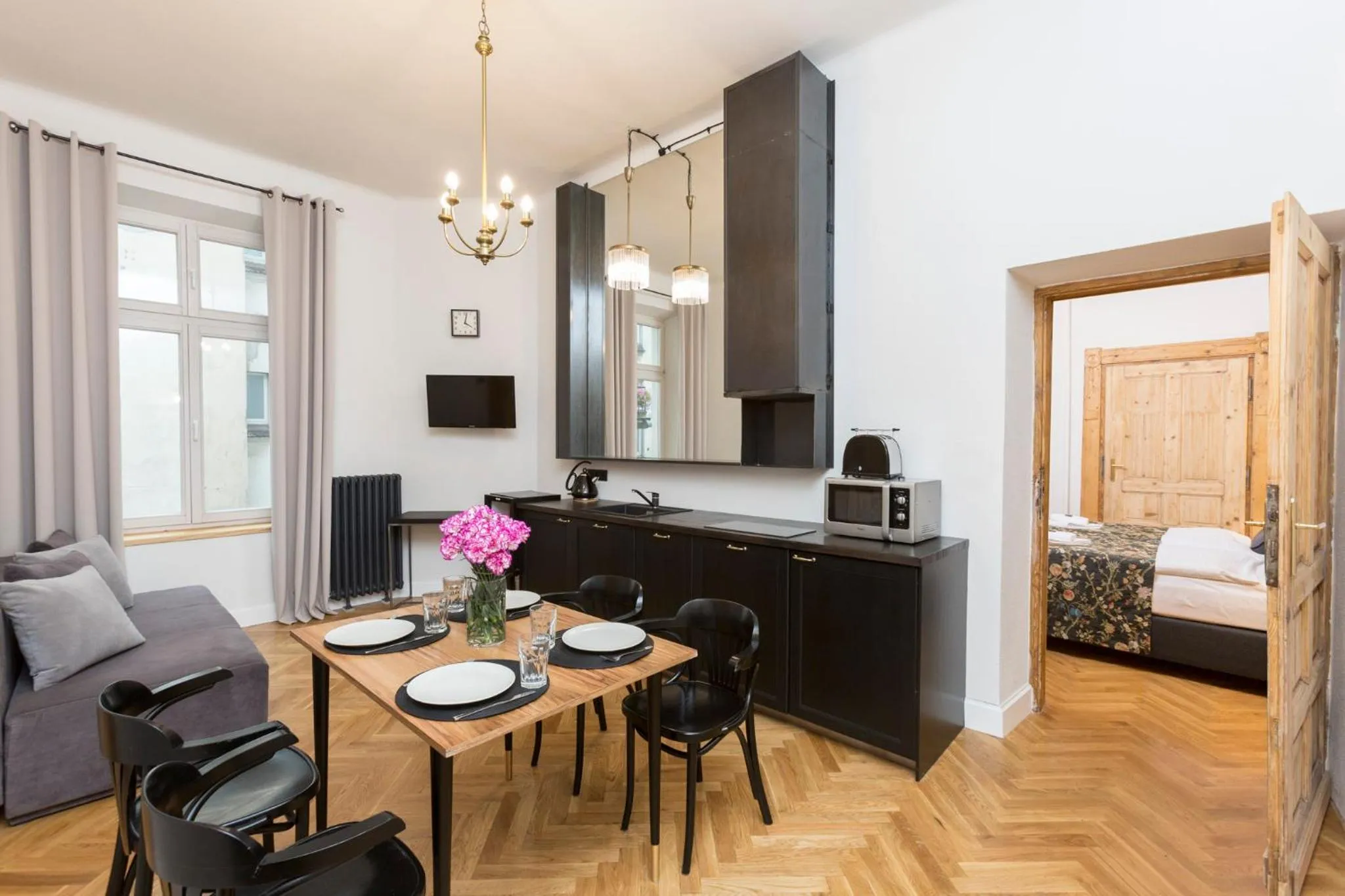 Kitchen or kitchenette, Bed in Antique Apartments Plac Szczepański