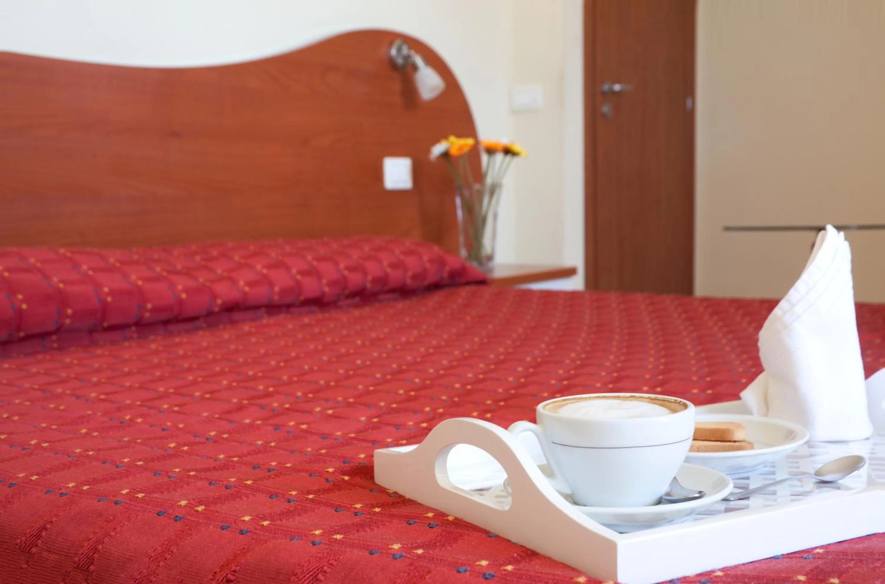 Bed in Motta Residence Hotel