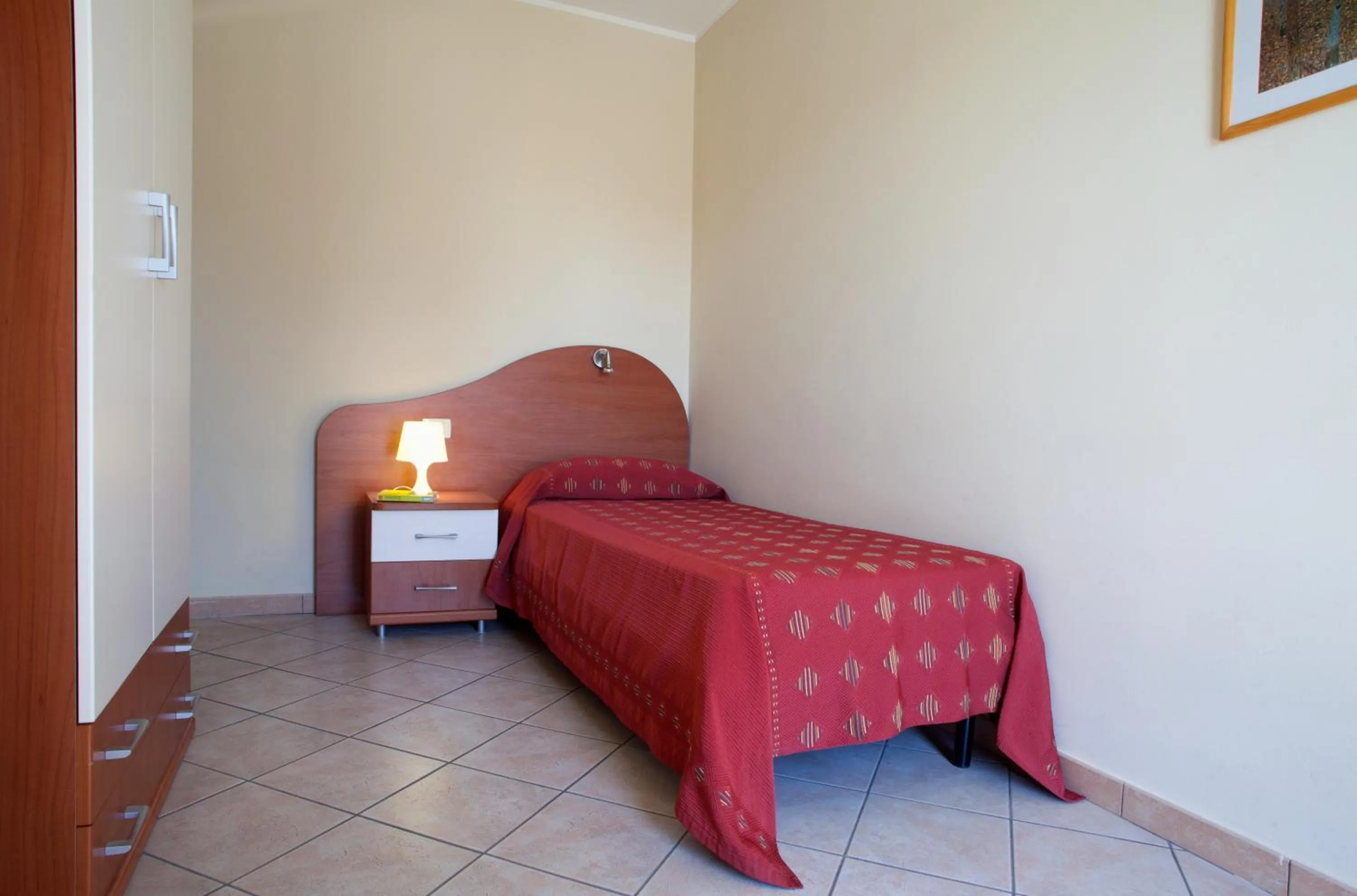 Bed in Motta Residence Hotel