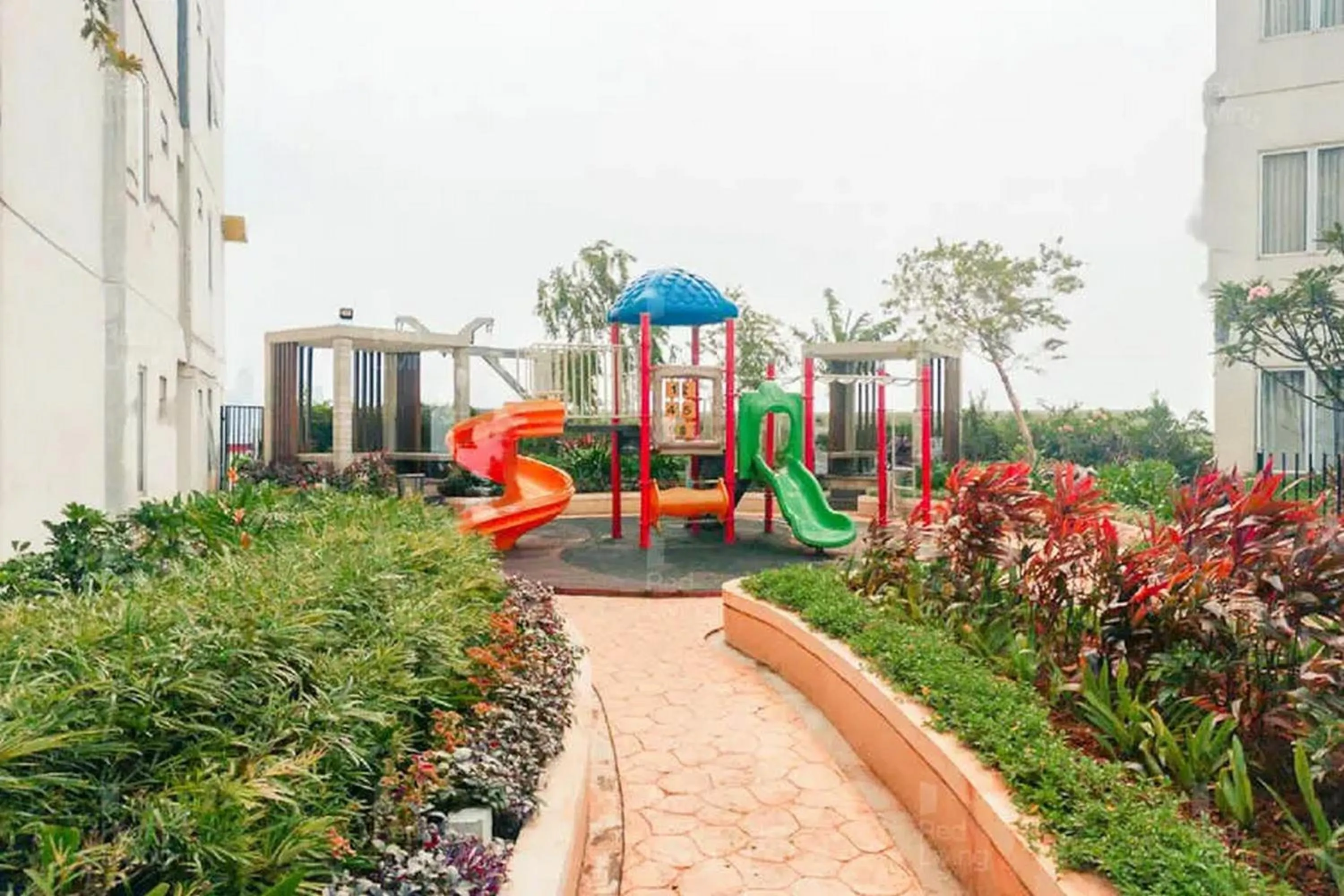 Children play ground in RedLiving Apartemen Bassura City - Byrin Property Tower Heliconia