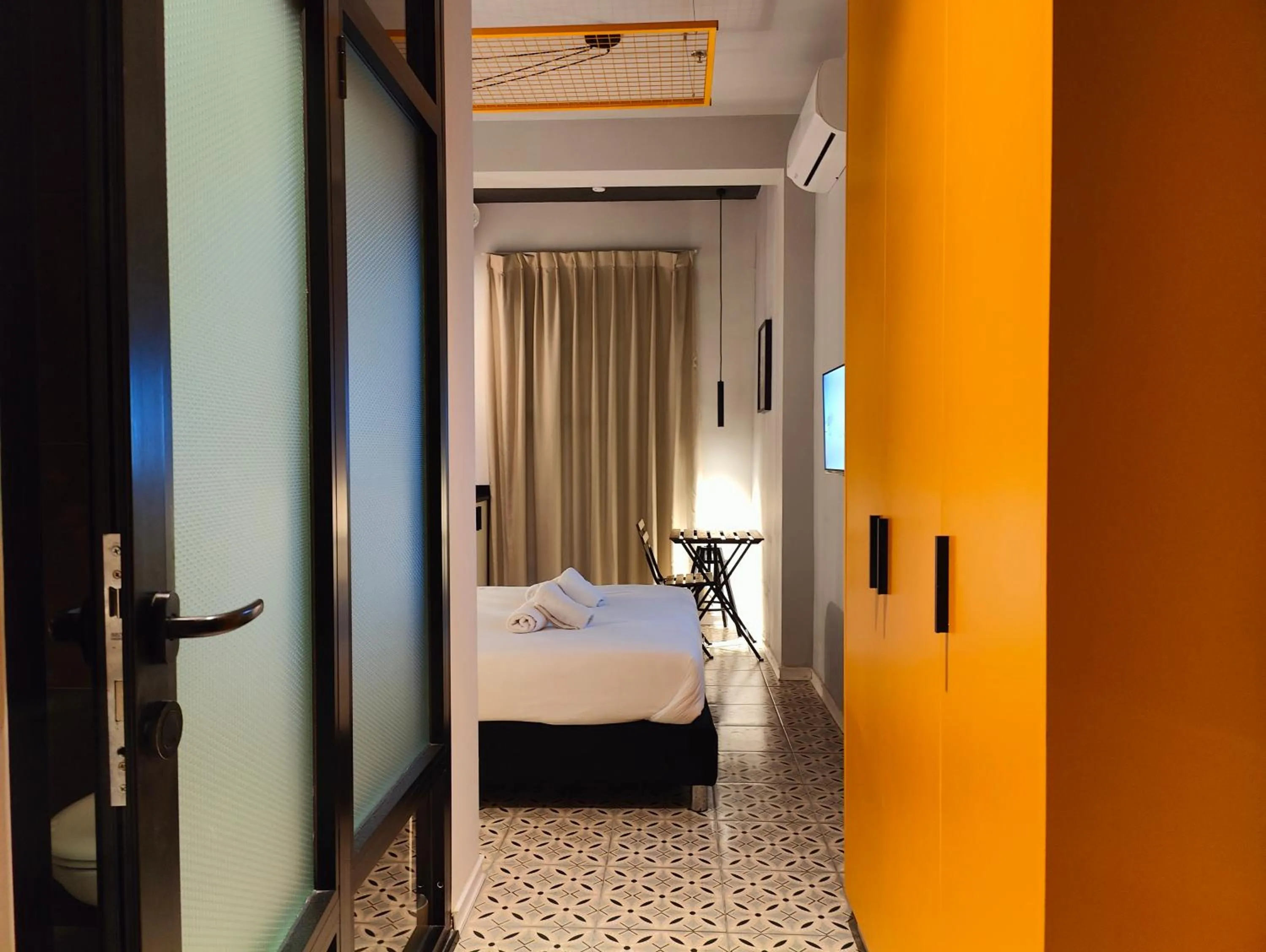 Bed in Levinski Market Hotel