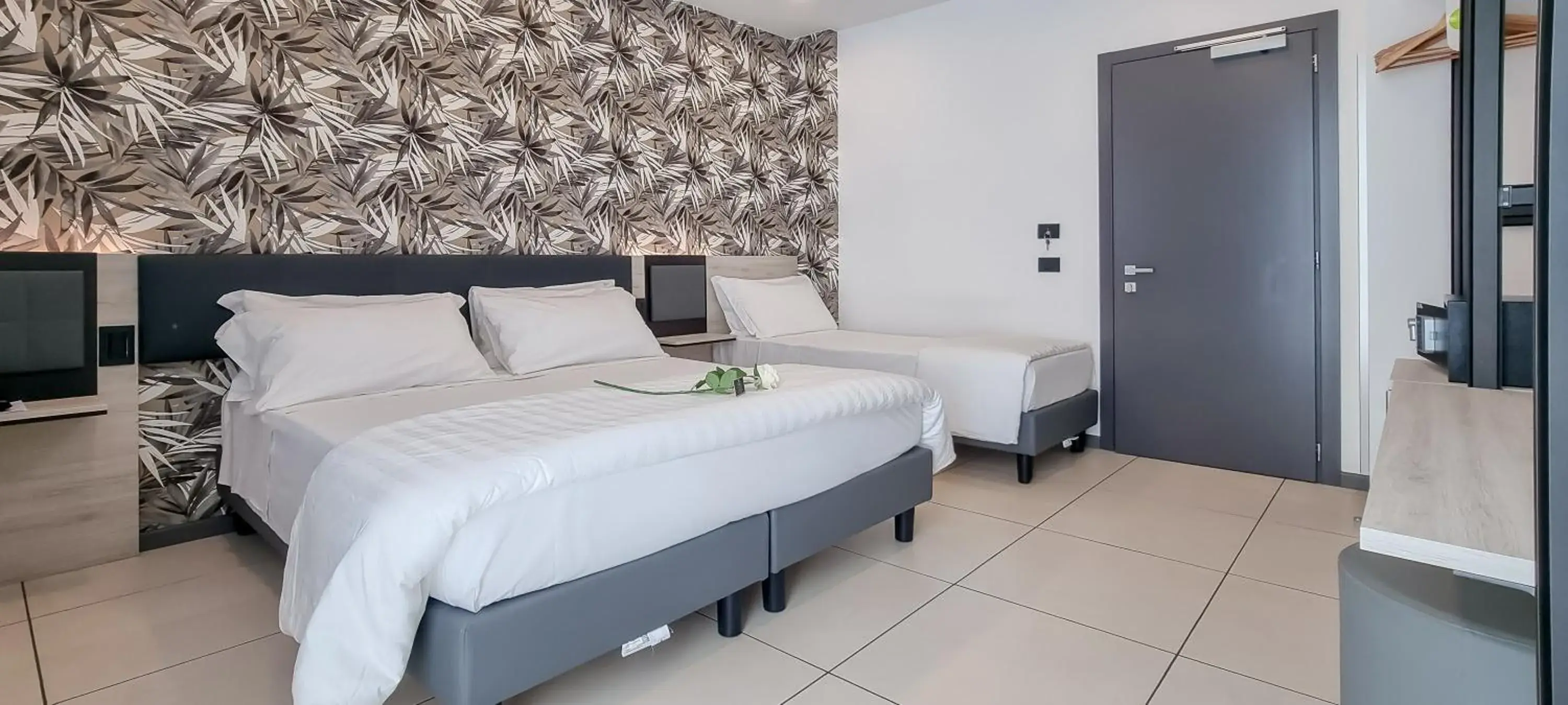 Superior Triple Room with Terrace and Kitchen Use in Hotel Benaco Garda ***S Superior Triple Room with Terrace and Kitchen Use in Hotel Benaco Garda ***S