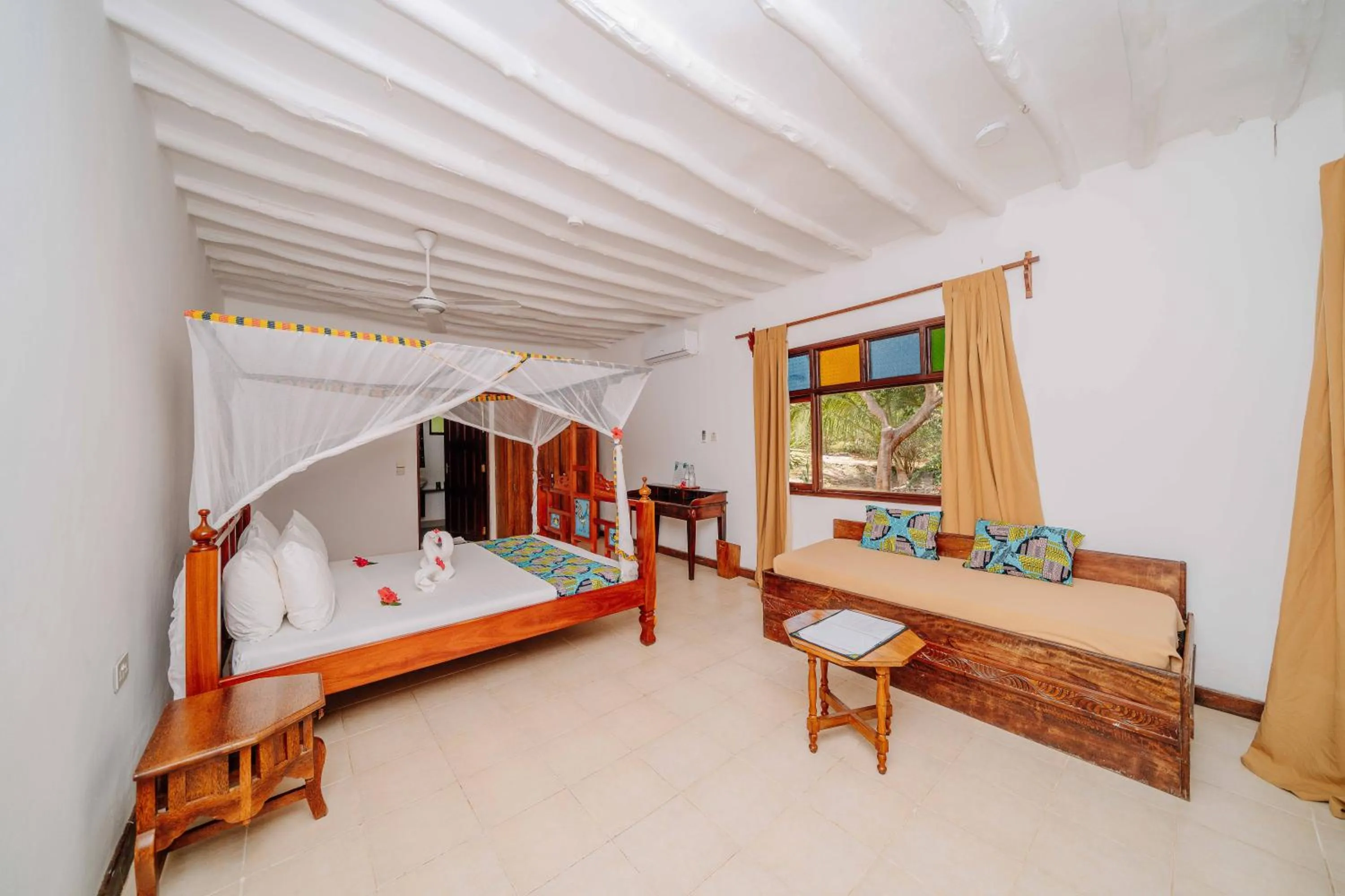 Photo of the whole room, Bed in Spice Island Hotel & Resort