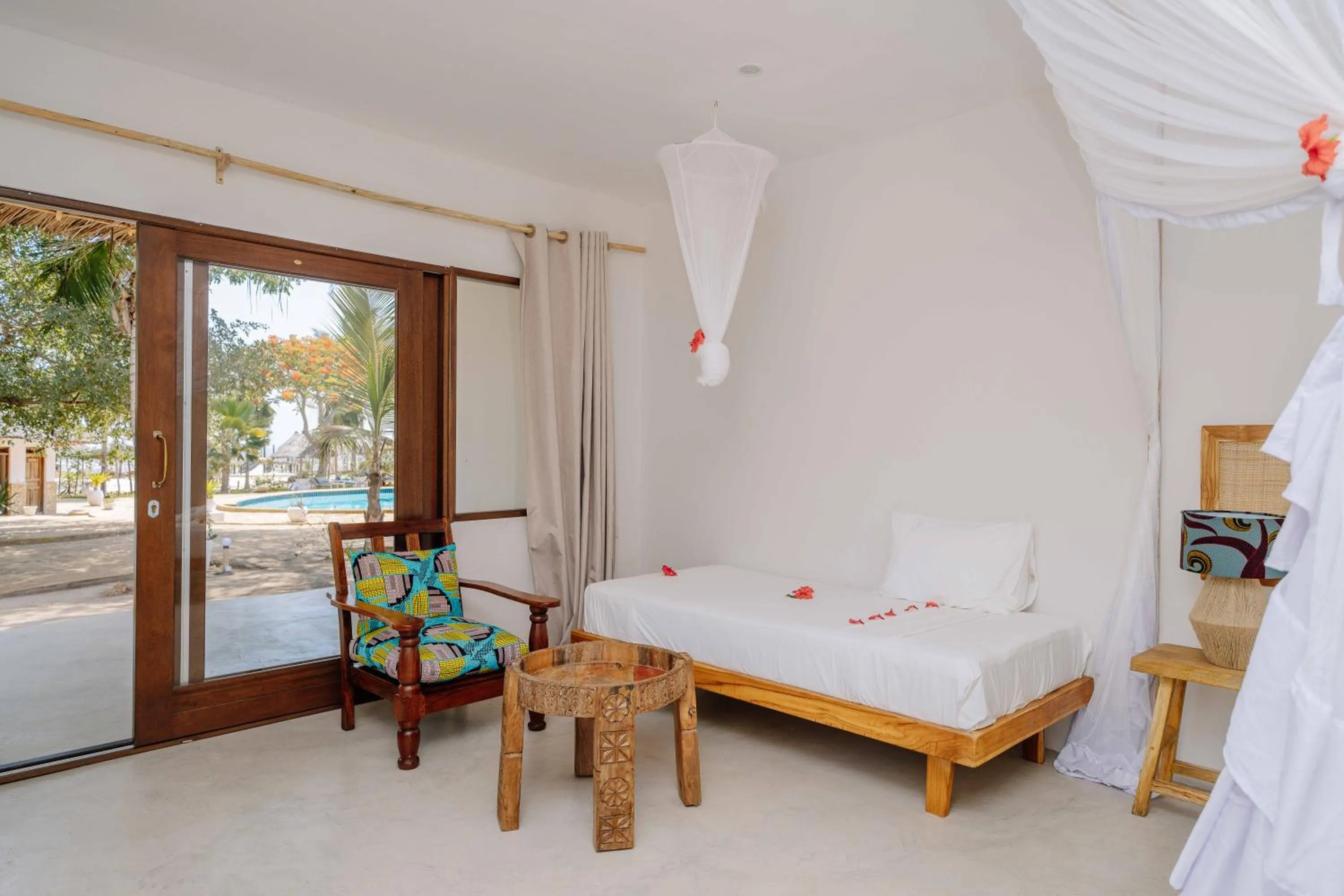 Patio, Bed in Spice Island Hotel & Resort
