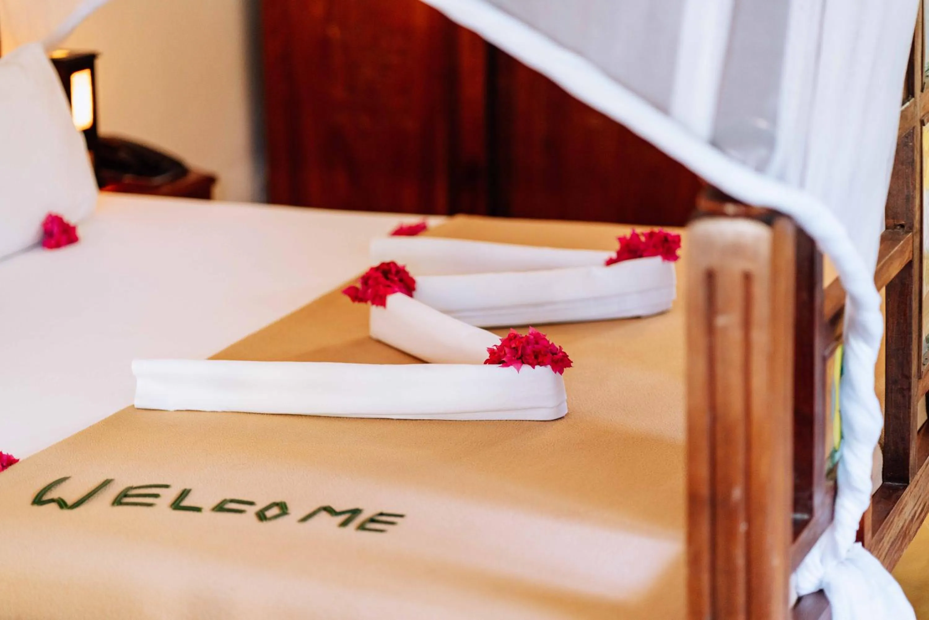 Bed in Spice Island Hotel & Resort