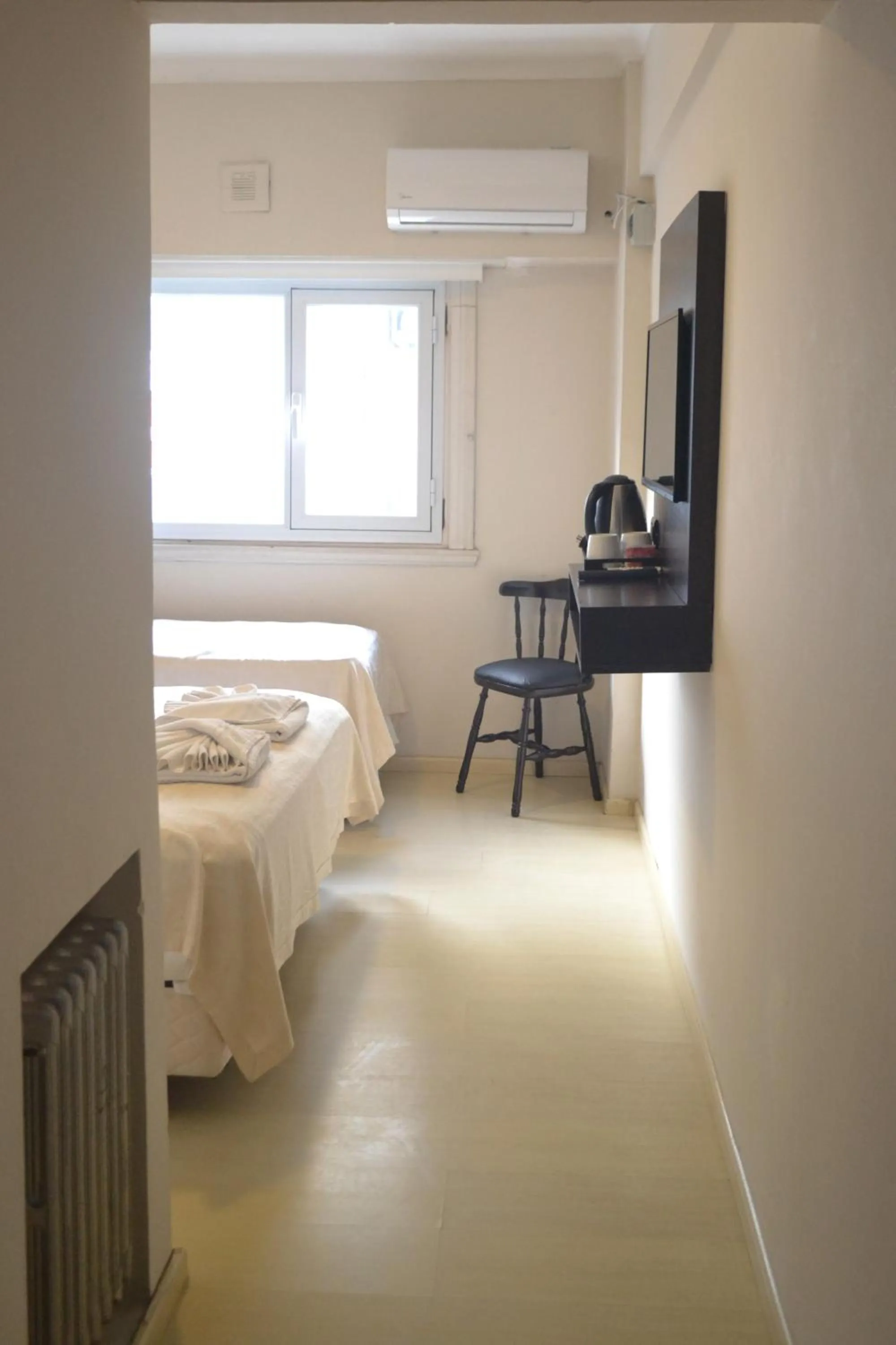 Photo of the whole room, Bed in Nuevo Horizonte Hotel