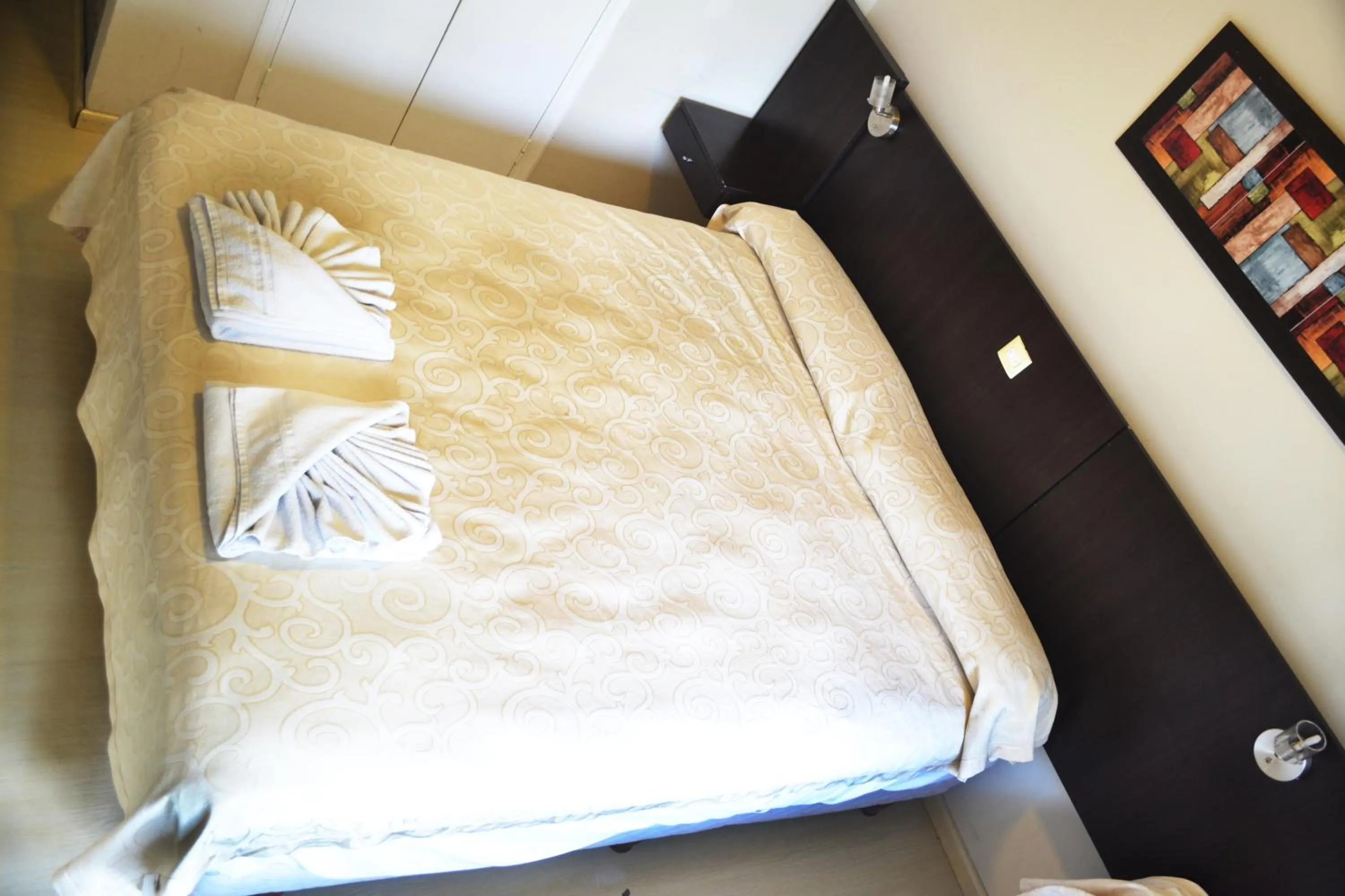 Photo of the whole room, Bed in Nuevo Horizonte Hotel