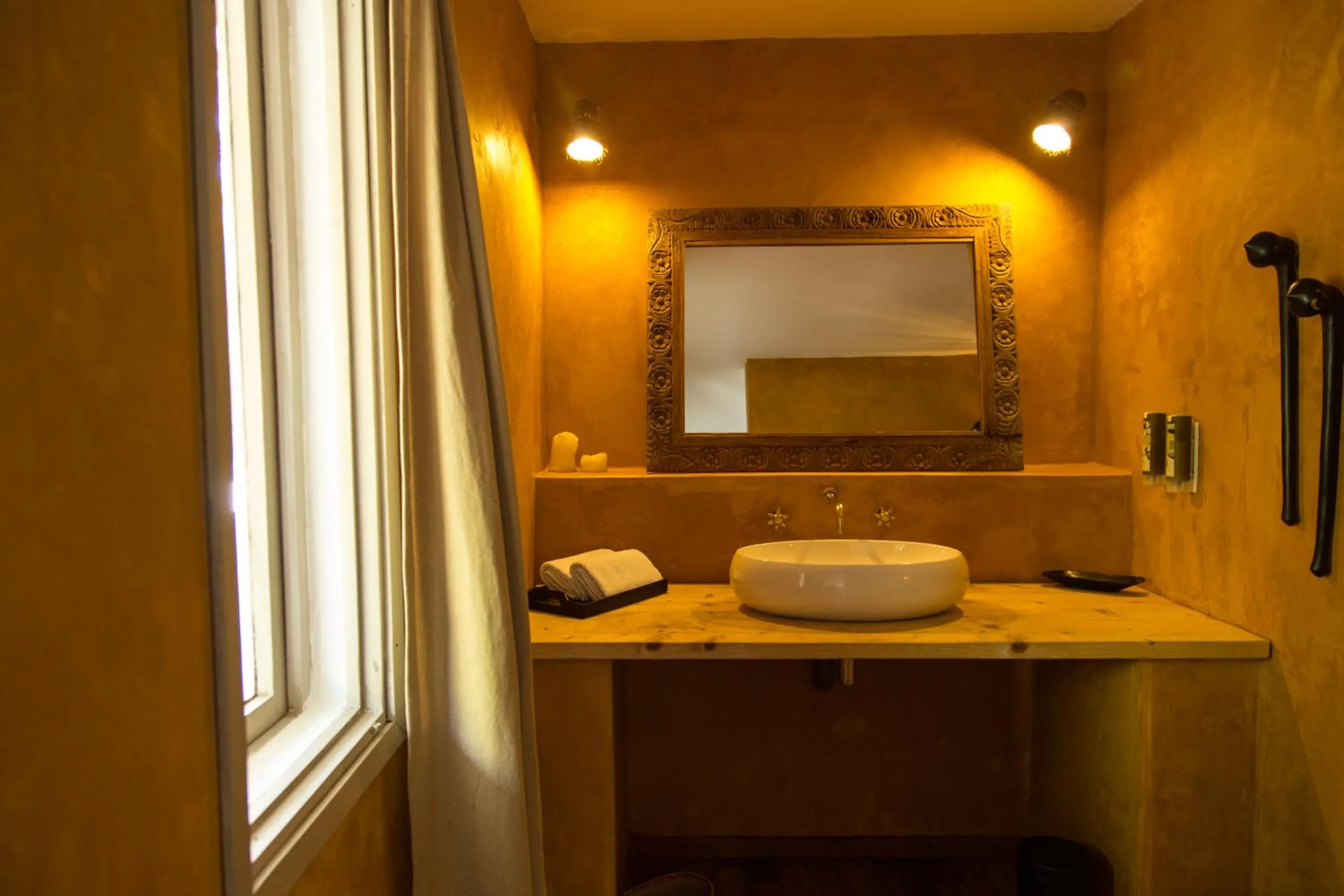 Bathroom in Uzuri Boutique Hotel