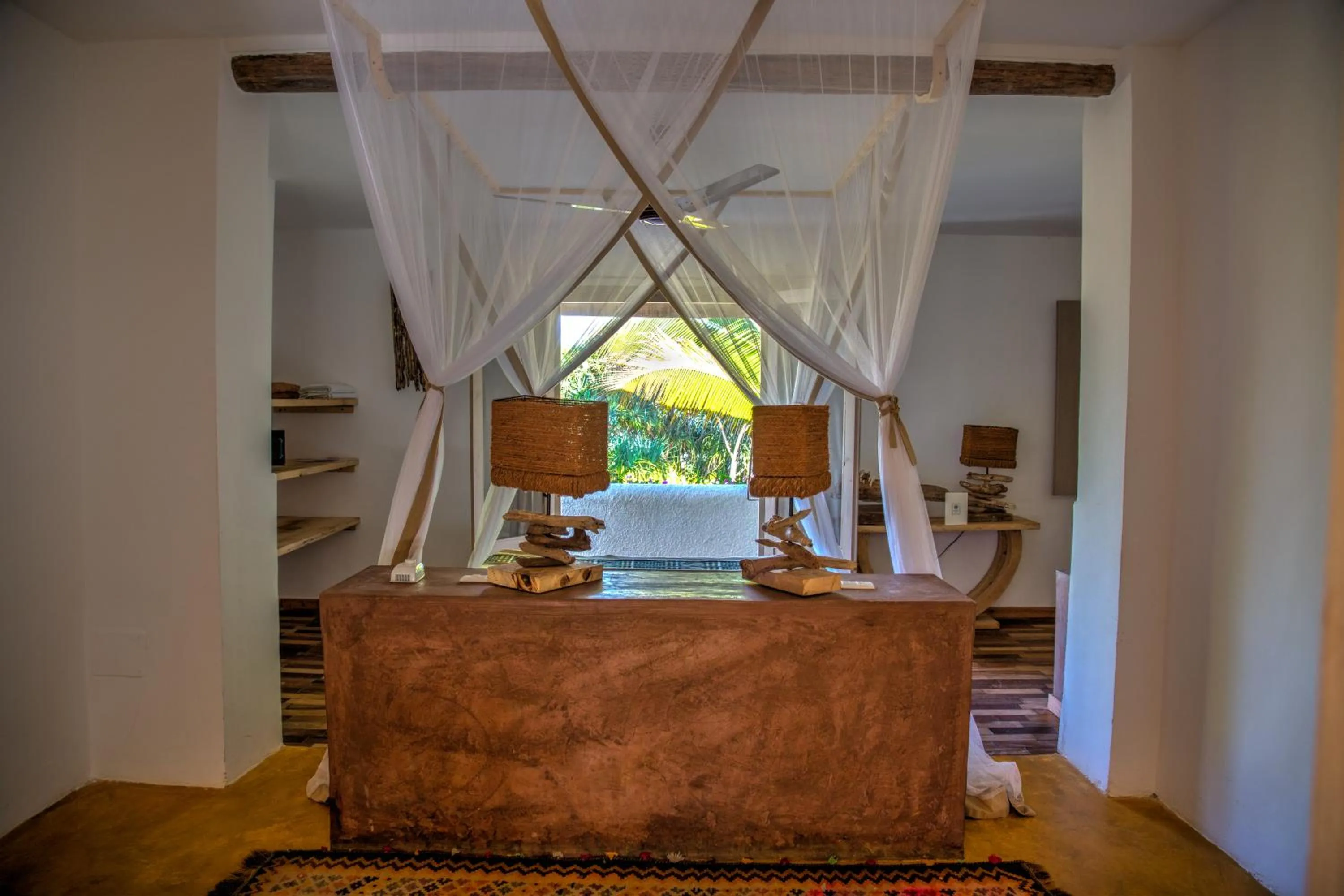 Bed in Uzuri Boutique Hotel