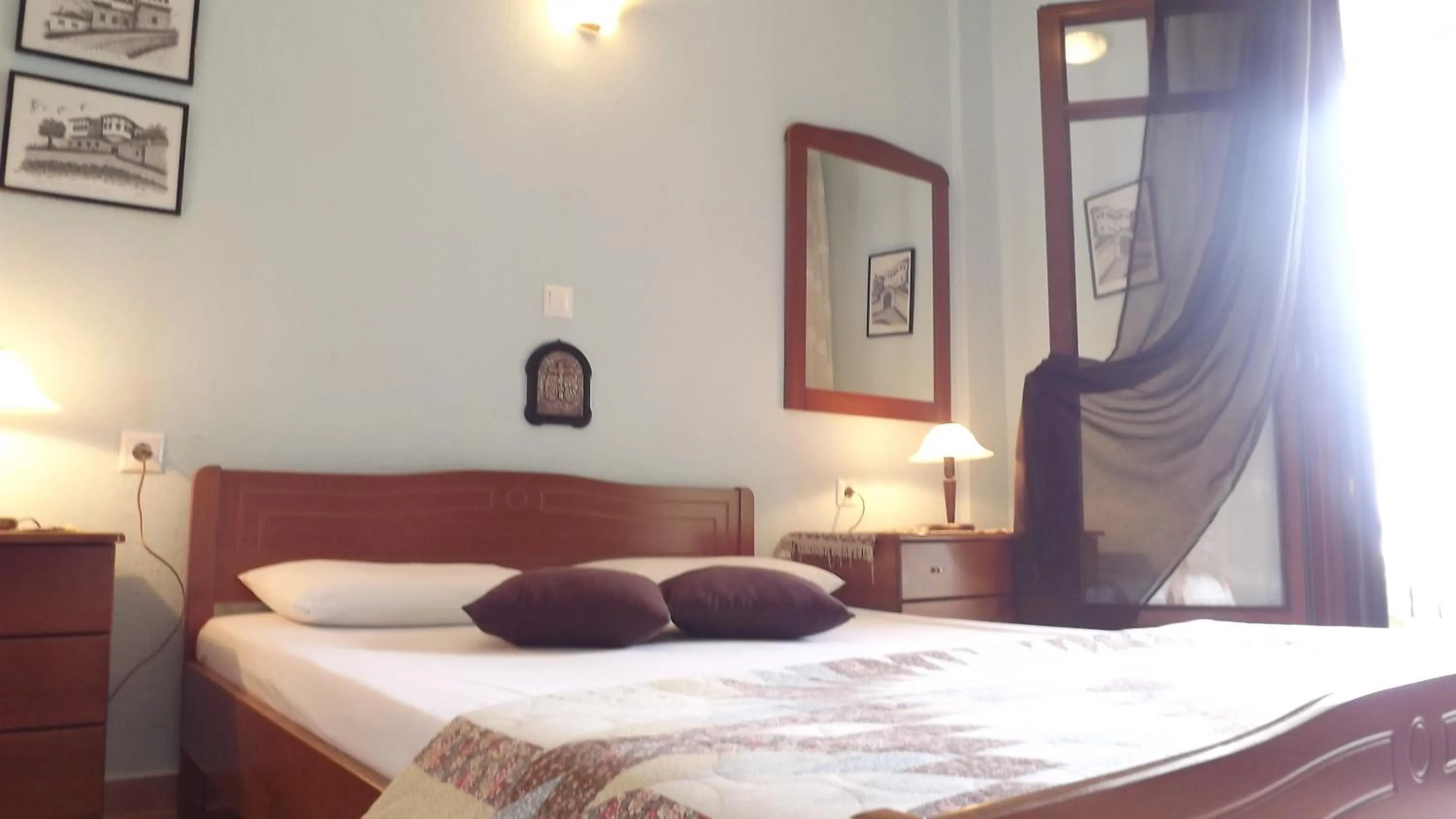 Bed in Pefka Studios & Apartments