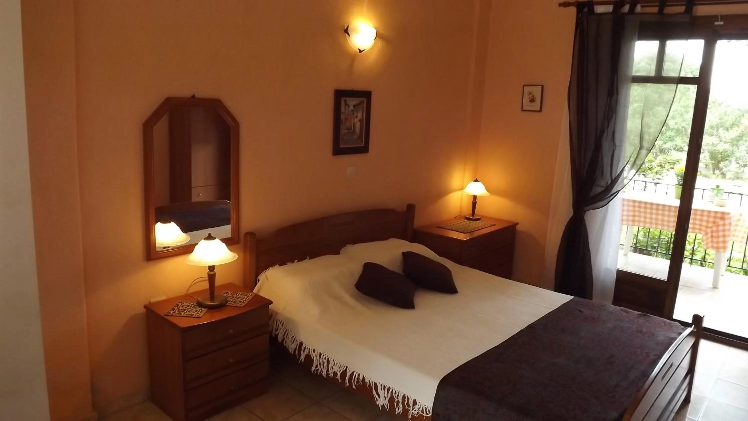 Bed in Pefka Studios & Apartments