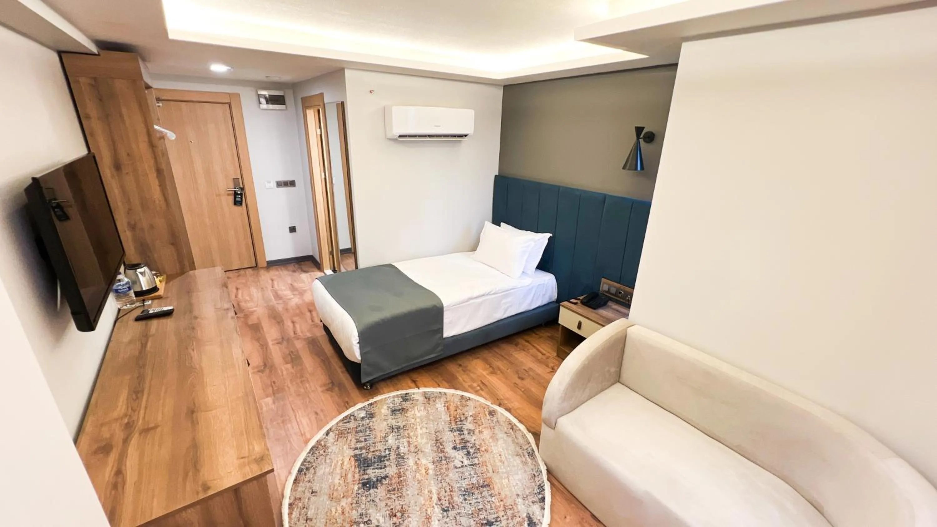 Bed in Nira Boutique Hotel