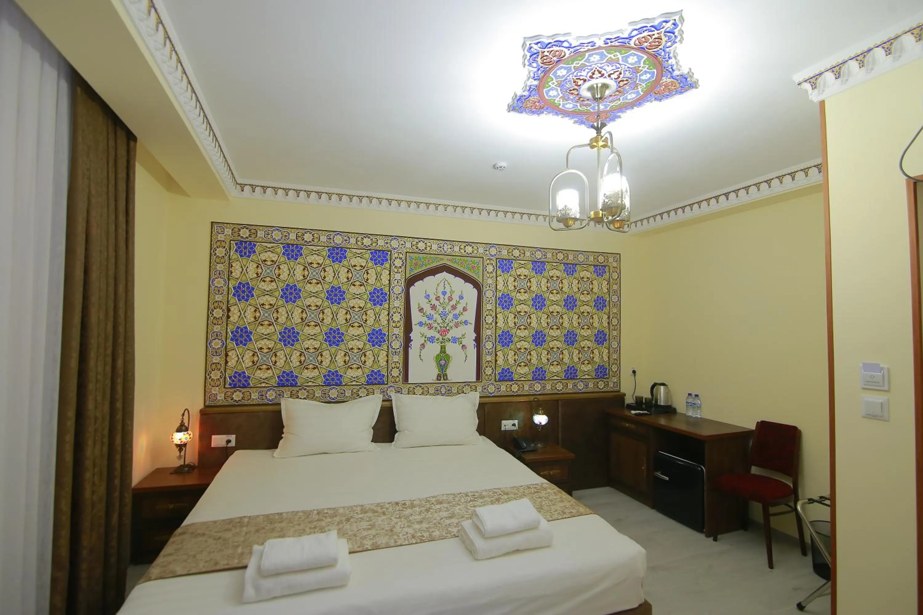 Bed in Sahar Boutique Hotel
