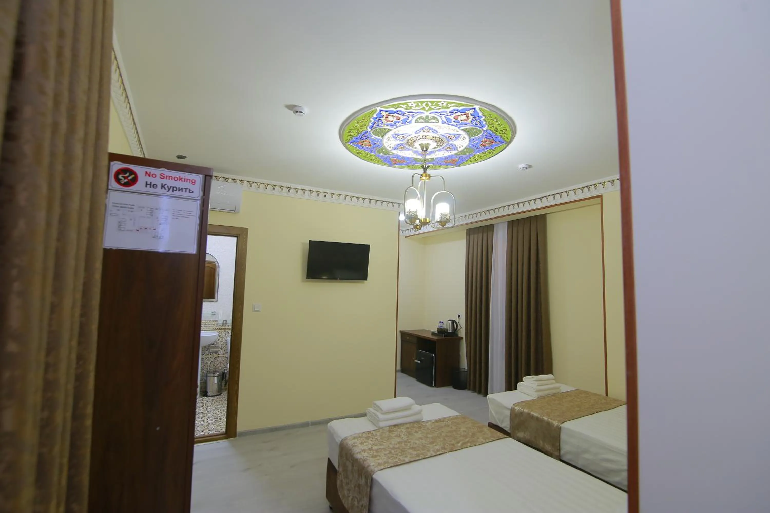 Bed in Sahar Boutique Hotel