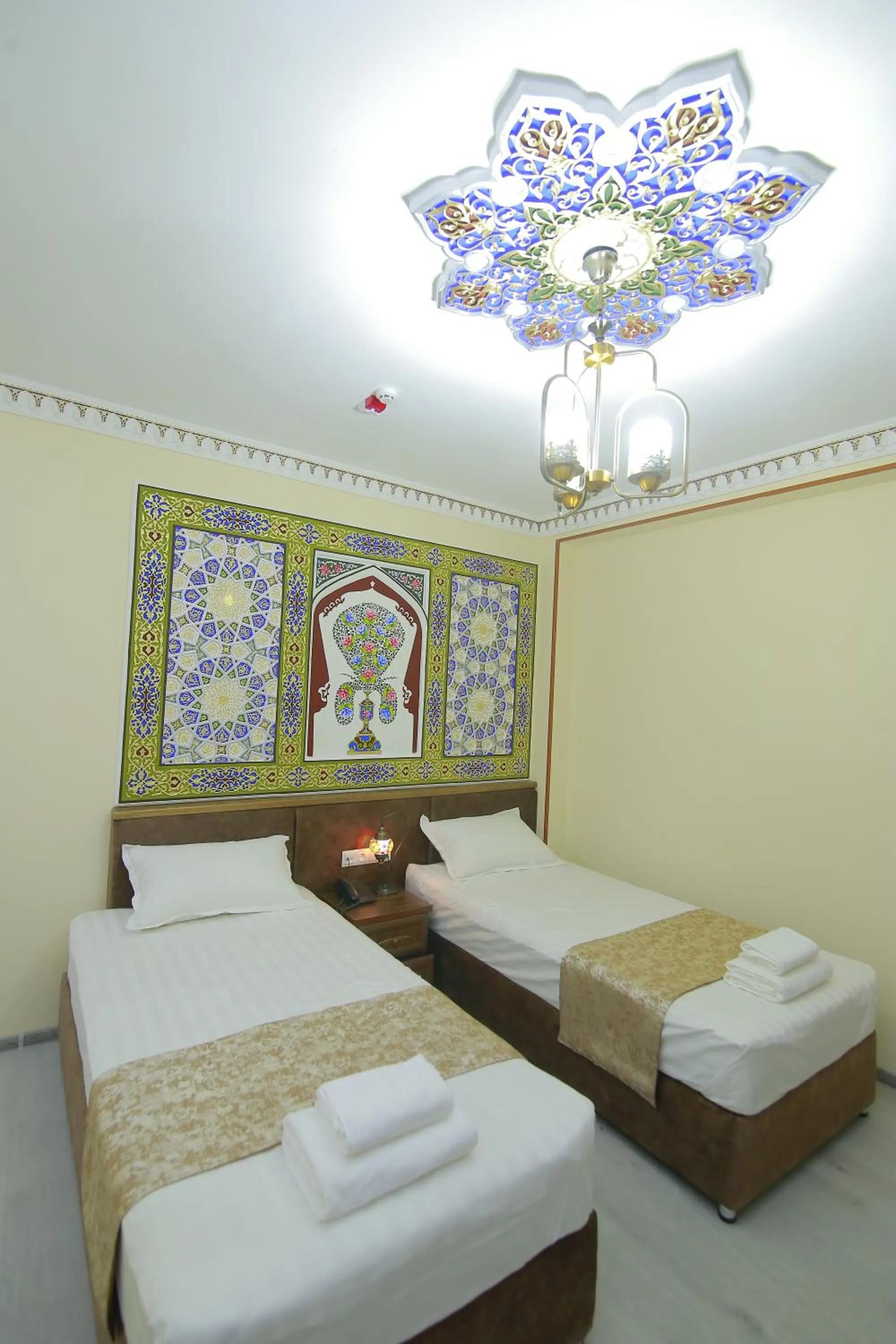 Bed in Sahar Boutique Hotel