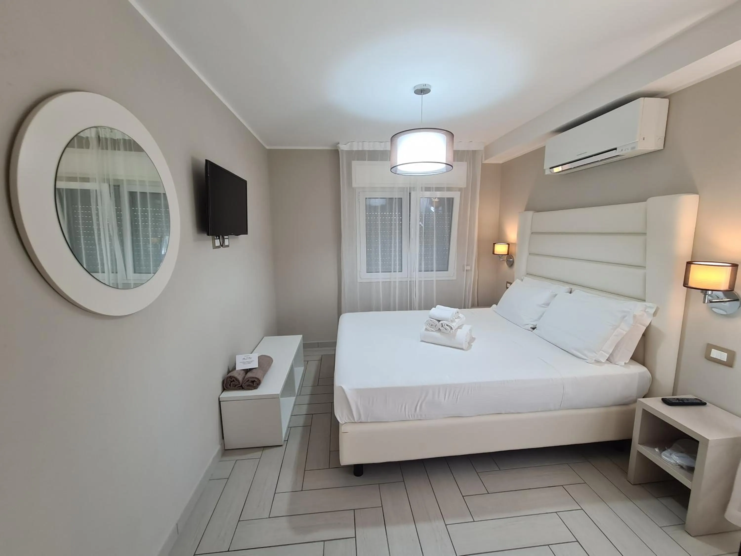 Bed in Nero D'Avorio Apartments