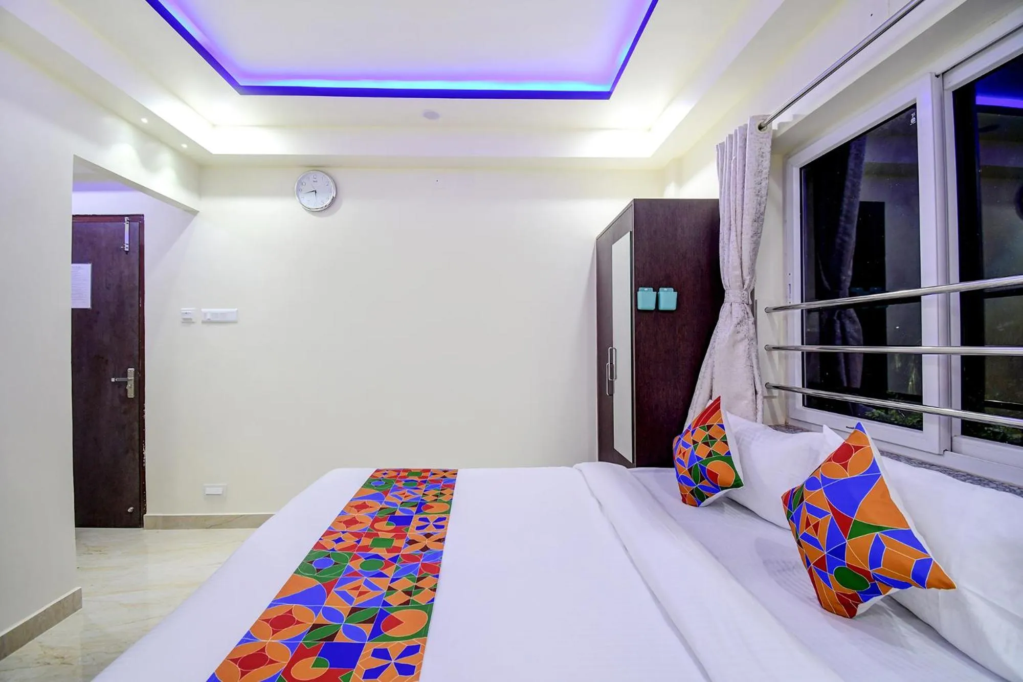 Bed in FabHotel Anchorage Inn - Nr Axis Mall