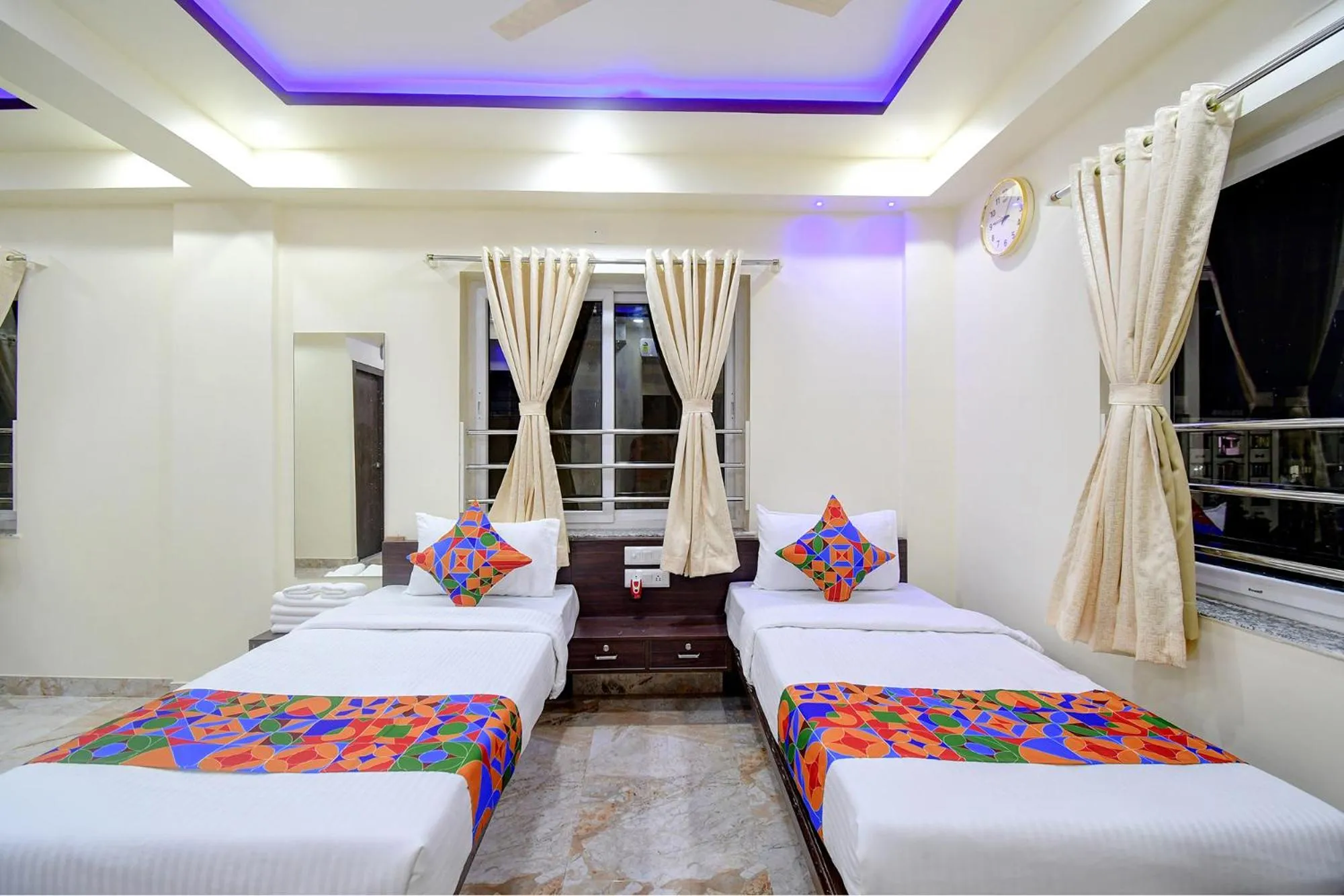 Bed in FabHotel Anchorage Inn - Nr Axis Mall