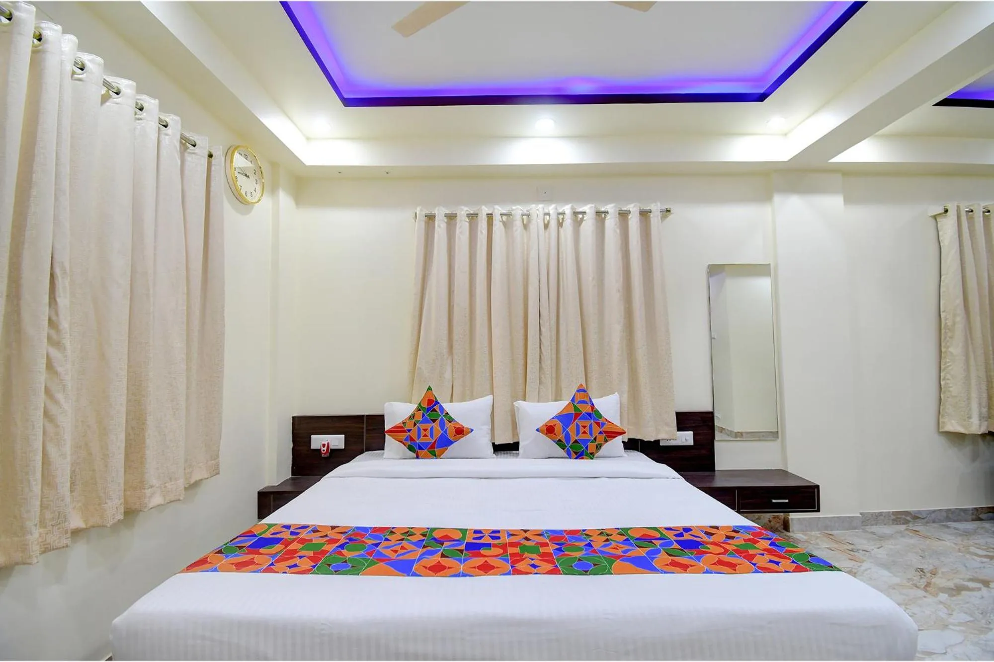 Bed in FabHotel Anchorage Inn - Nr Axis Mall