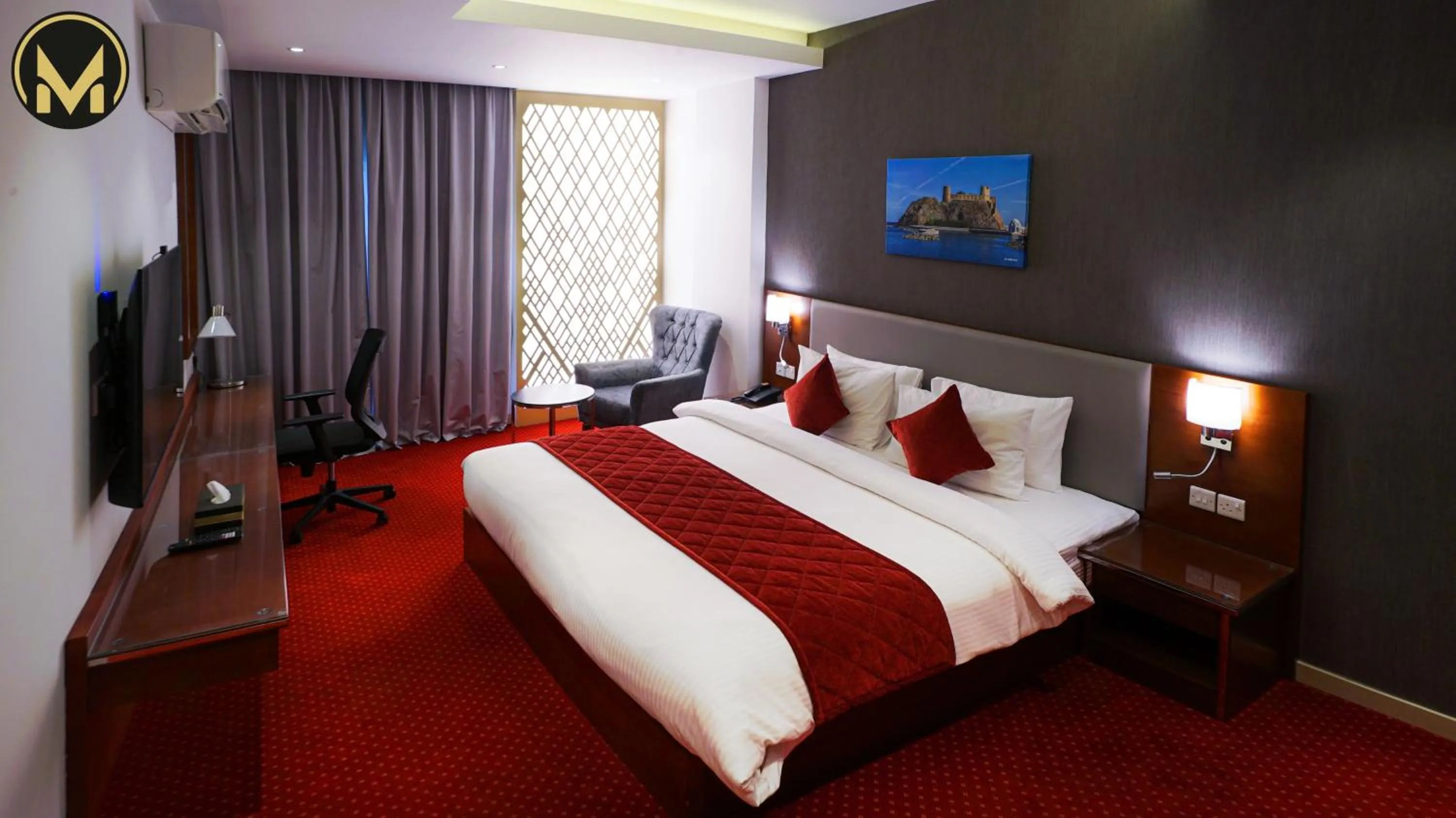 Bed in Muscat Express Hotel