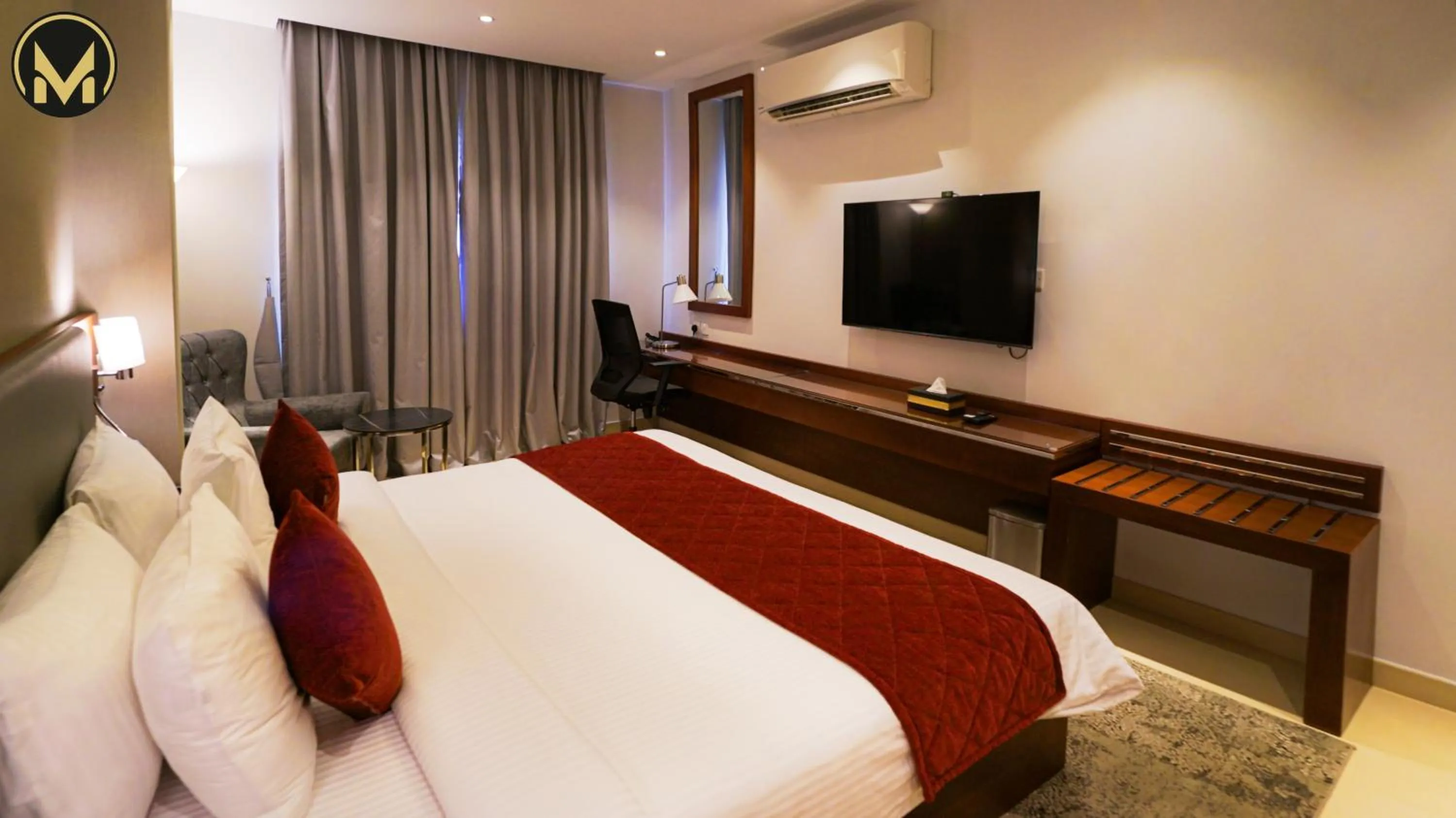 Bed in Muscat Express Hotel