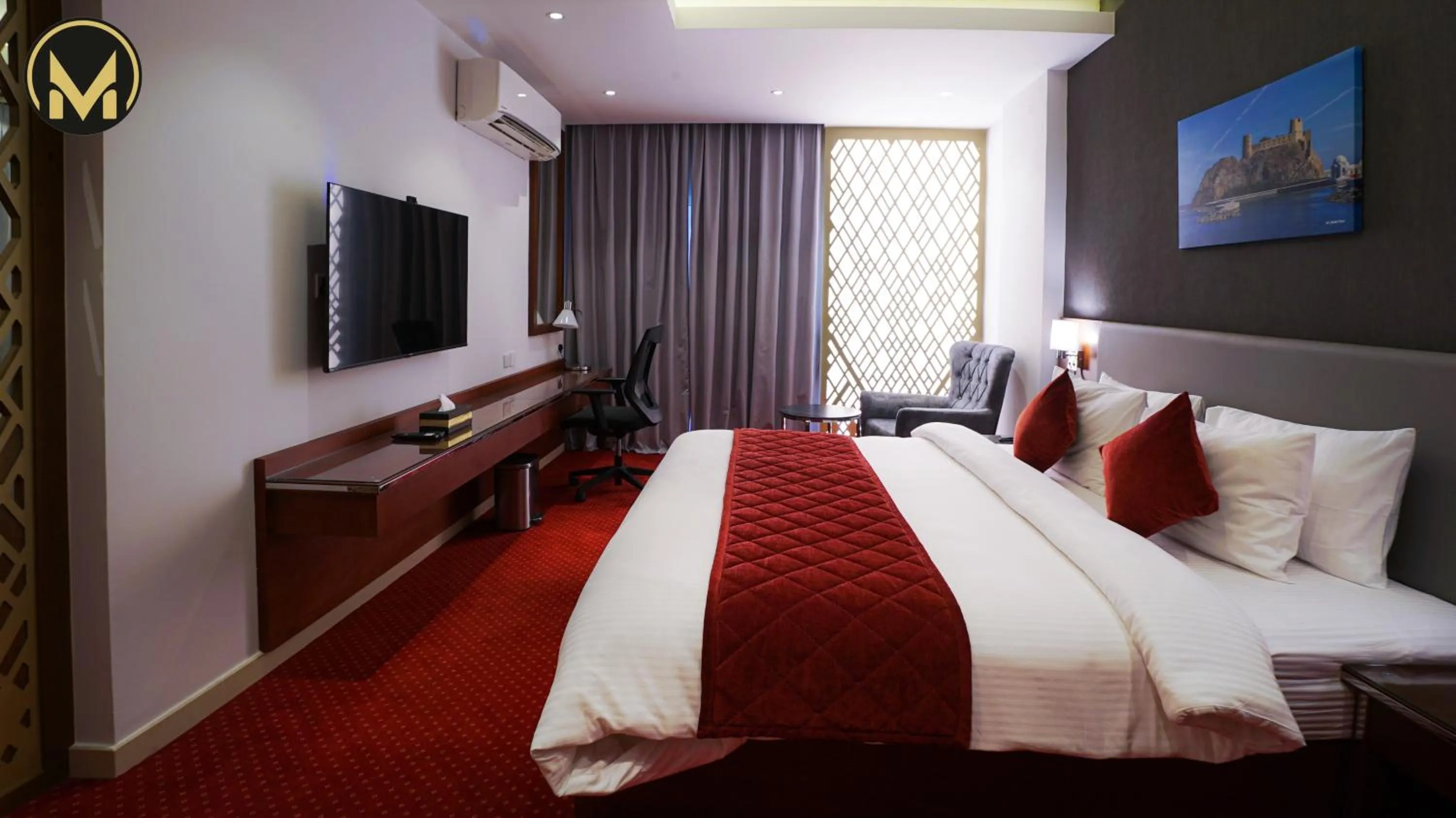 Bed in Muscat Express Hotel