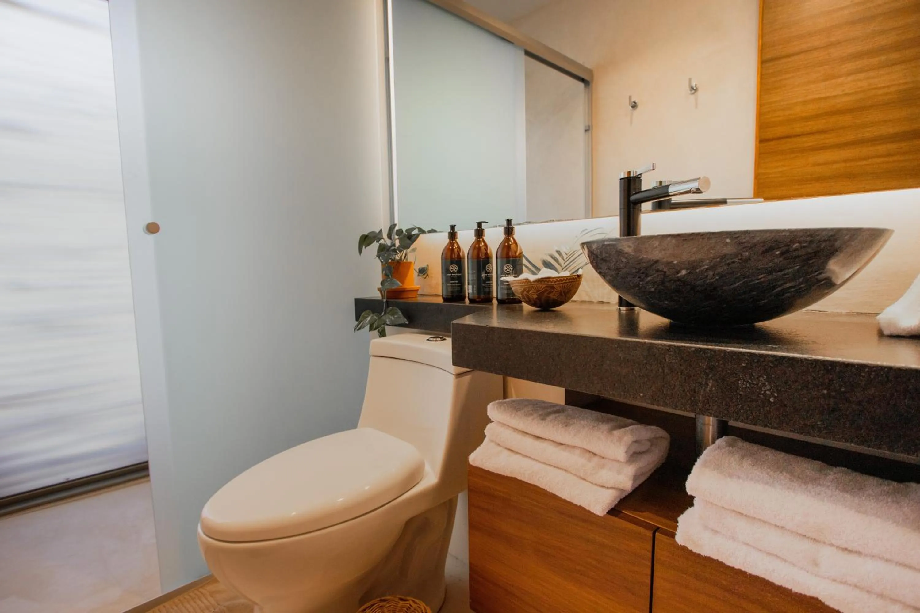 Bathroom in Spacious 2BR apt · Wide balcony w/tub & Yoga deck