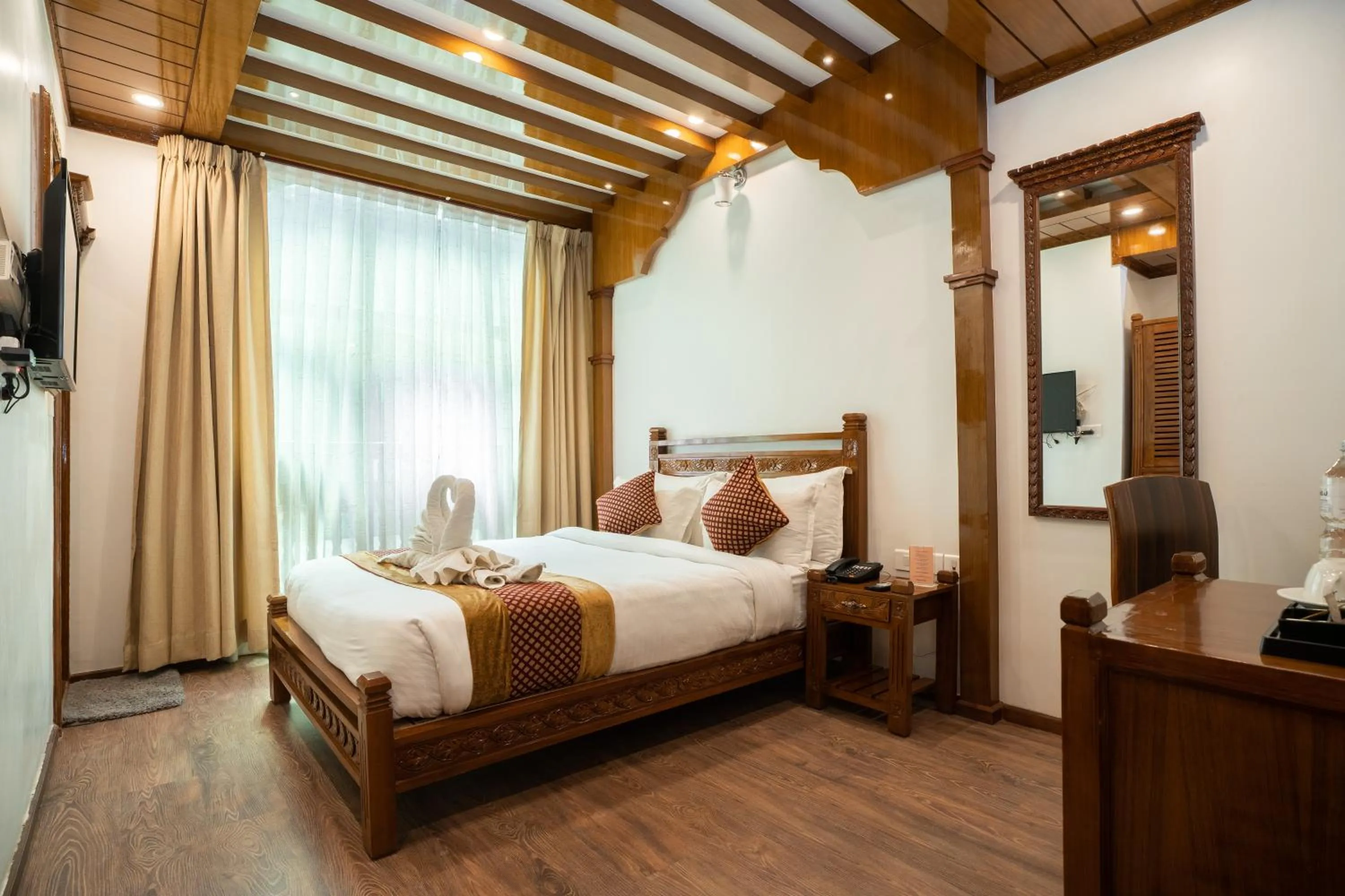 Bed in Surya Heritage Hotel