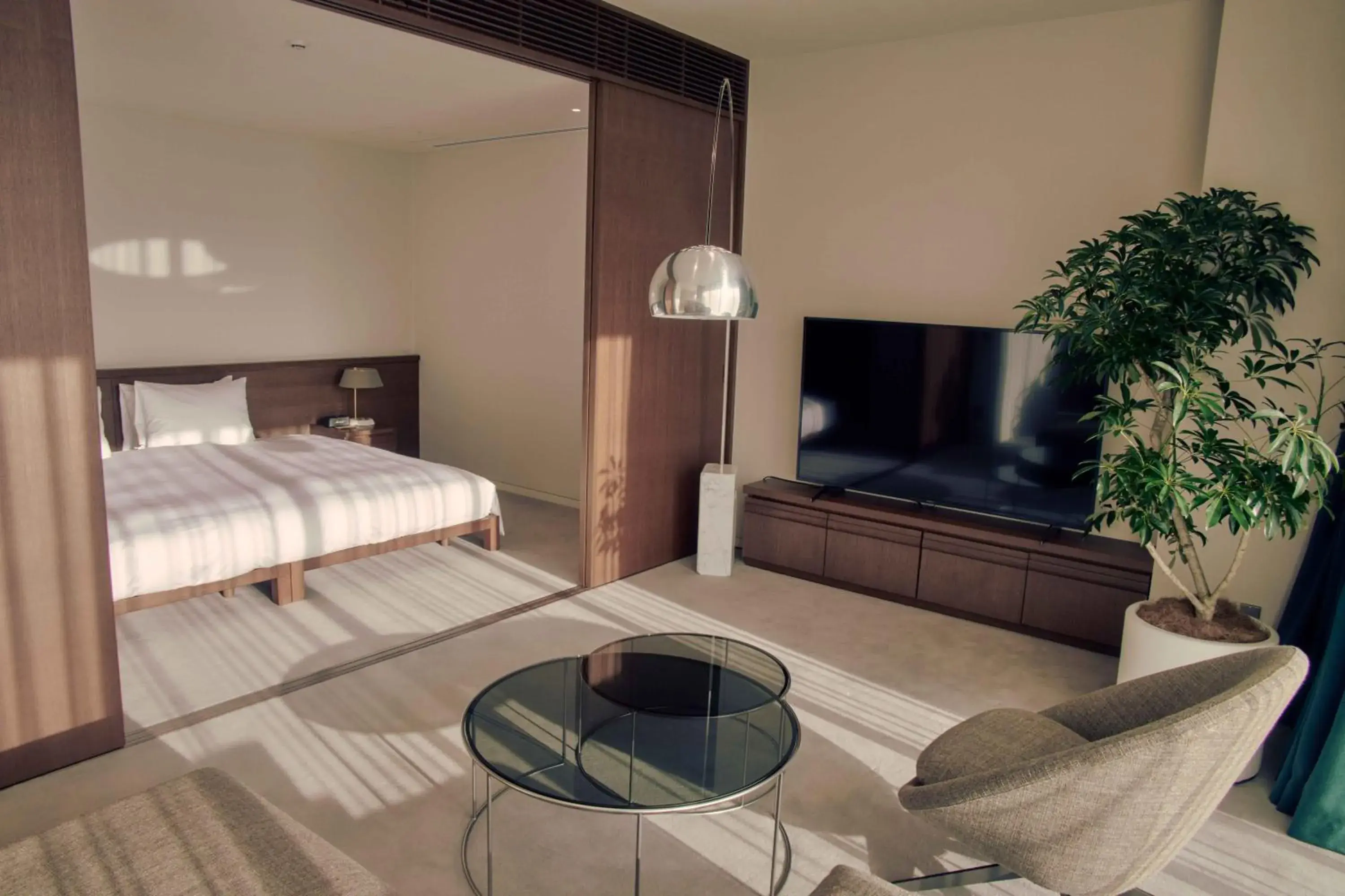 Residential Suite with Lounge Access - designed by Tadao Ando in Marufukuro Residential Suite with Lounge Access - designed by Tadao Ando in Marufukuro