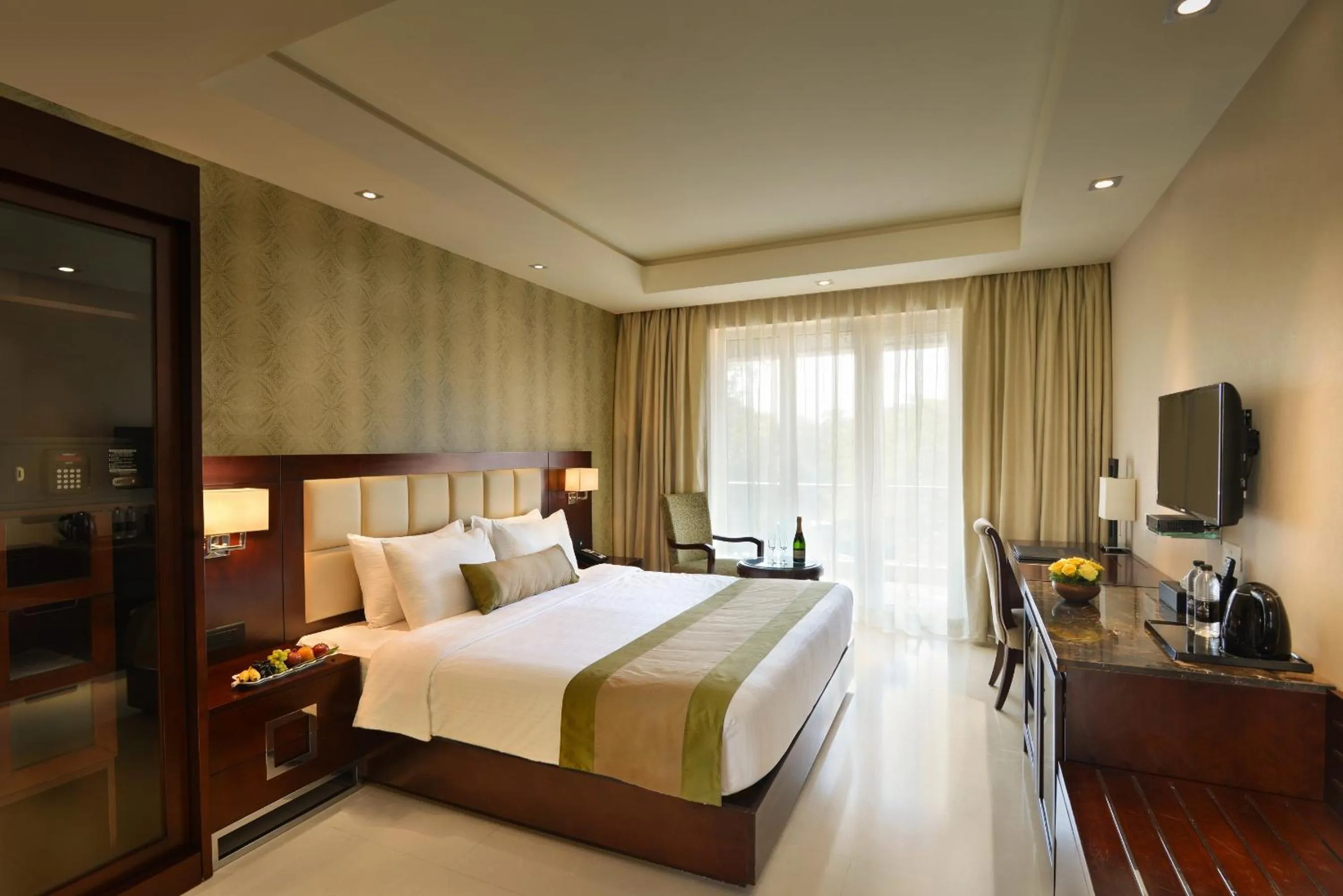 Bed in The Acacia Hotel & Spa