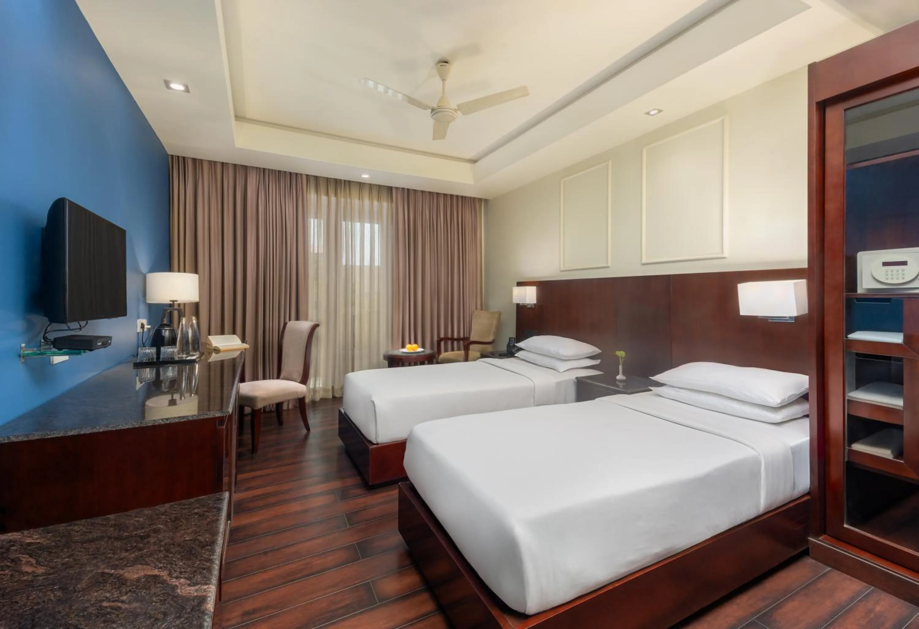 Bed in The Acacia Hotel & Spa