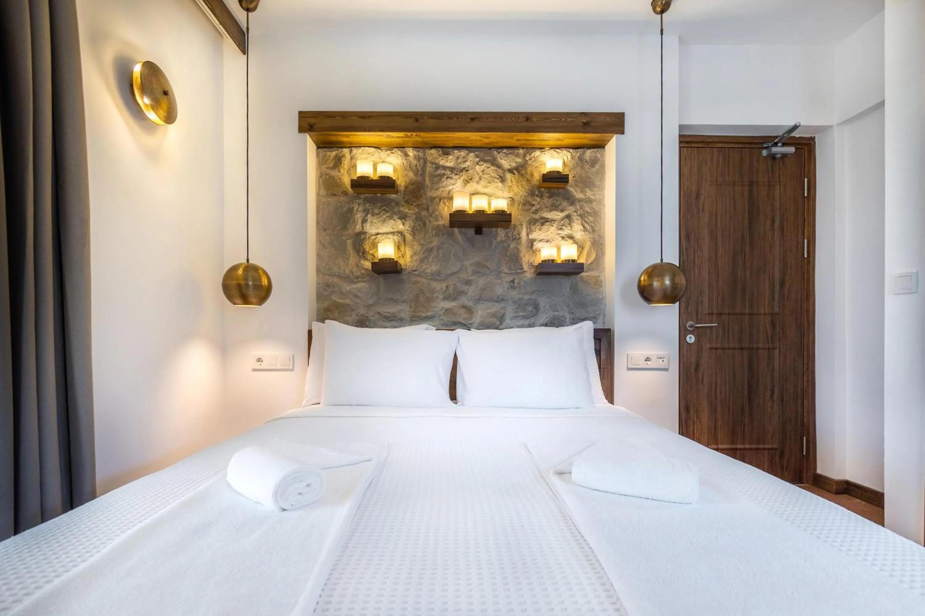 Bed in Elizya Boutique Hotel