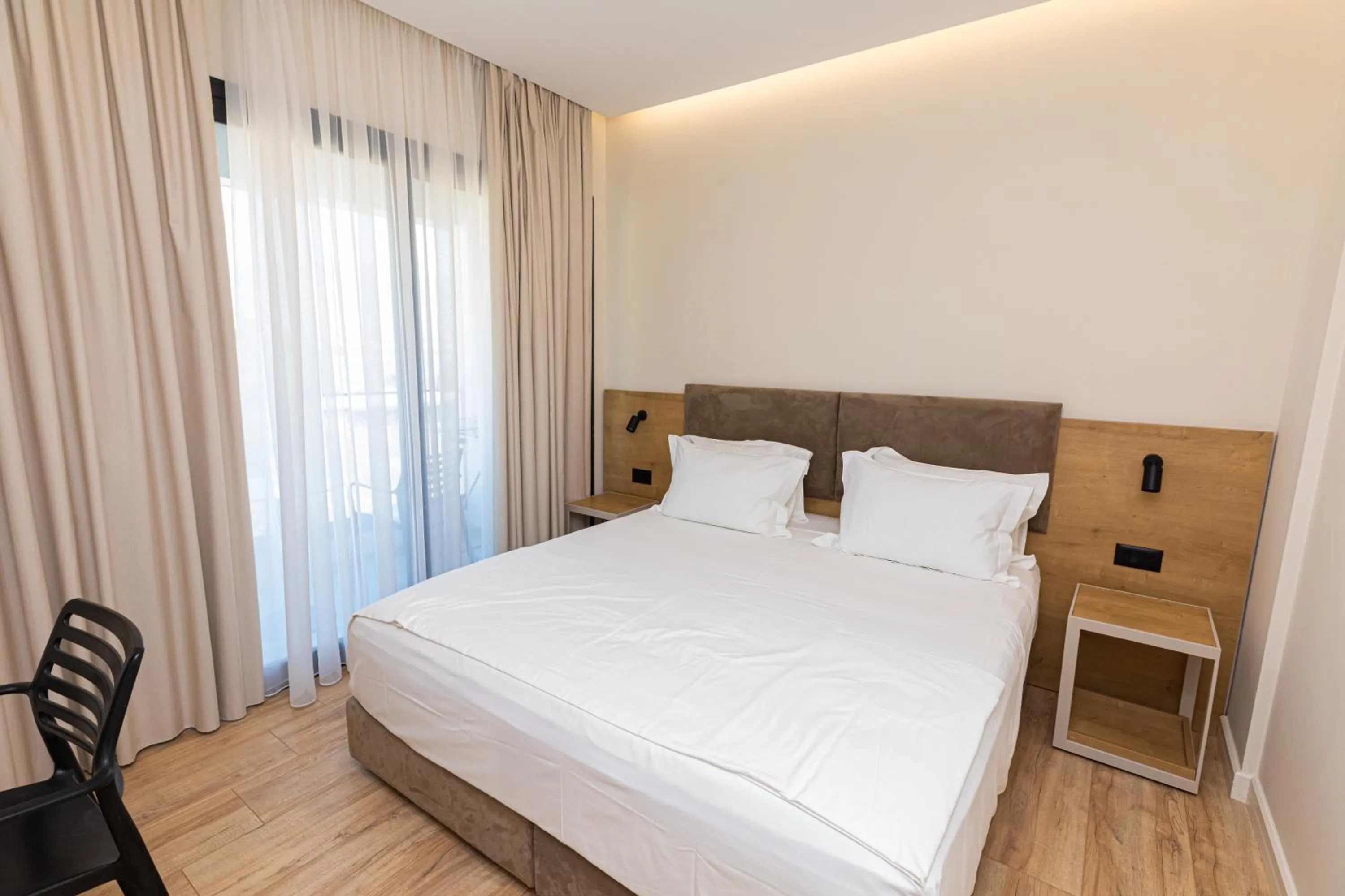 Bed in B&B Champagne, Vlore Bay