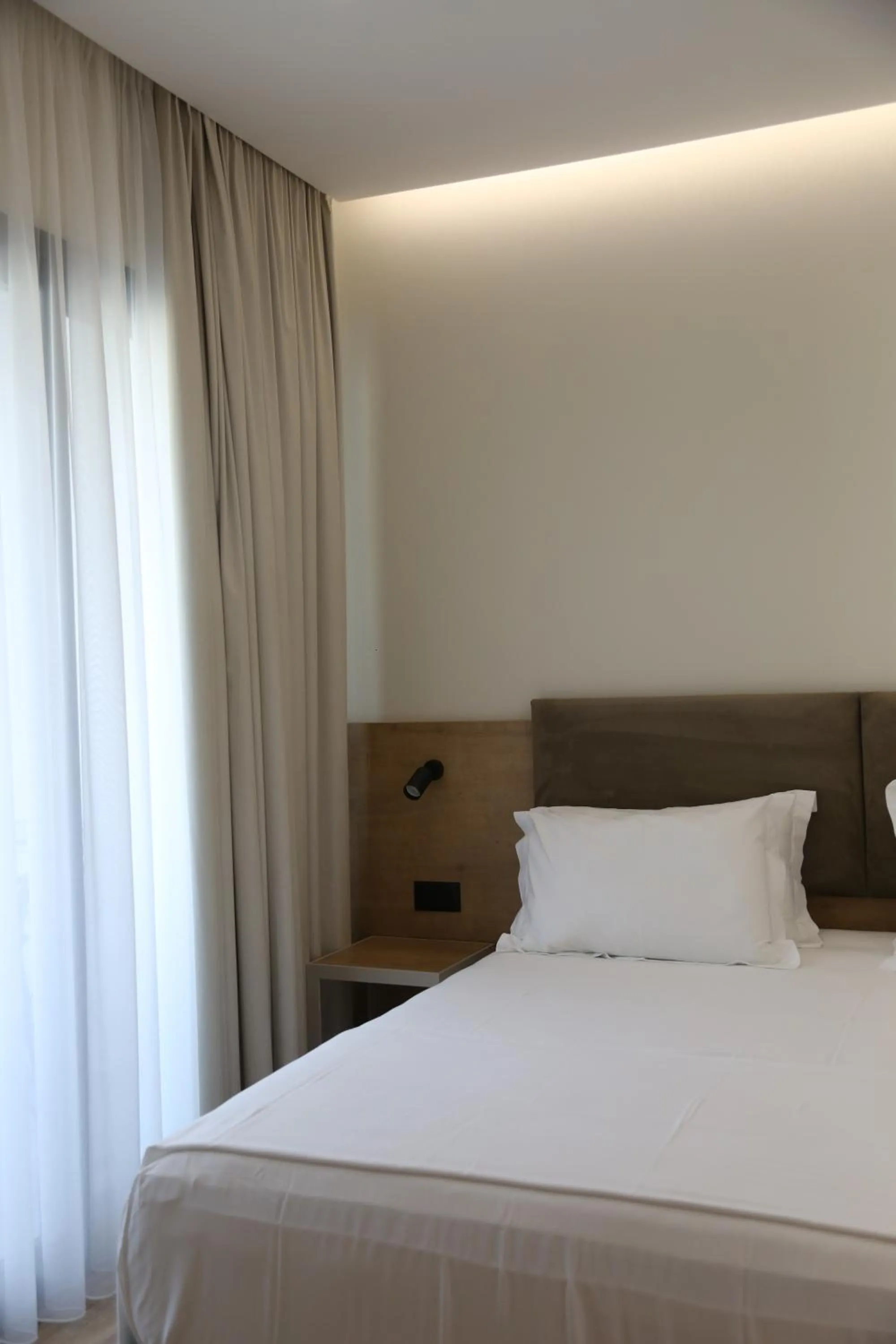 Bed in B&B Champagne, Vlore Bay