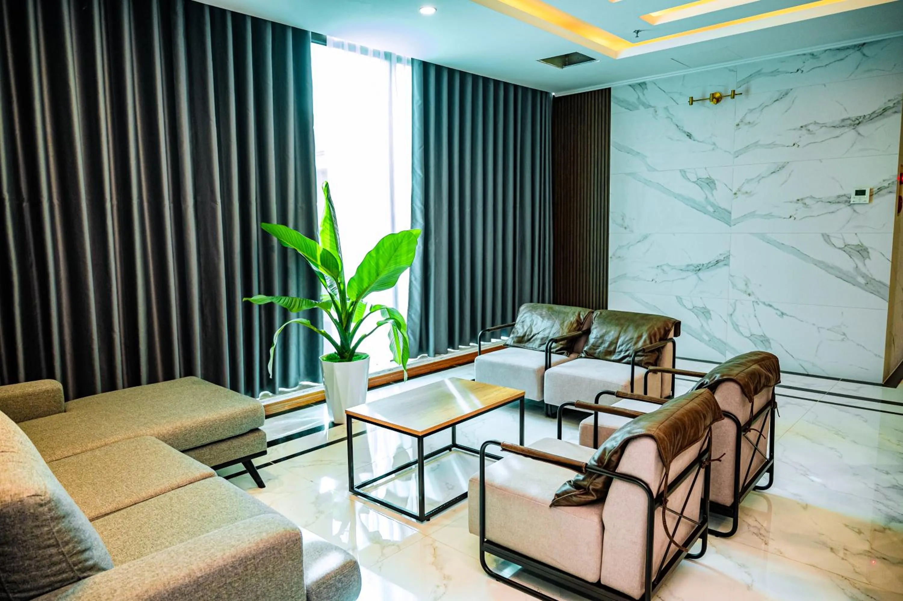 Communal lounge/ TV room in The King Hotel - Condotel Thai Nguyen