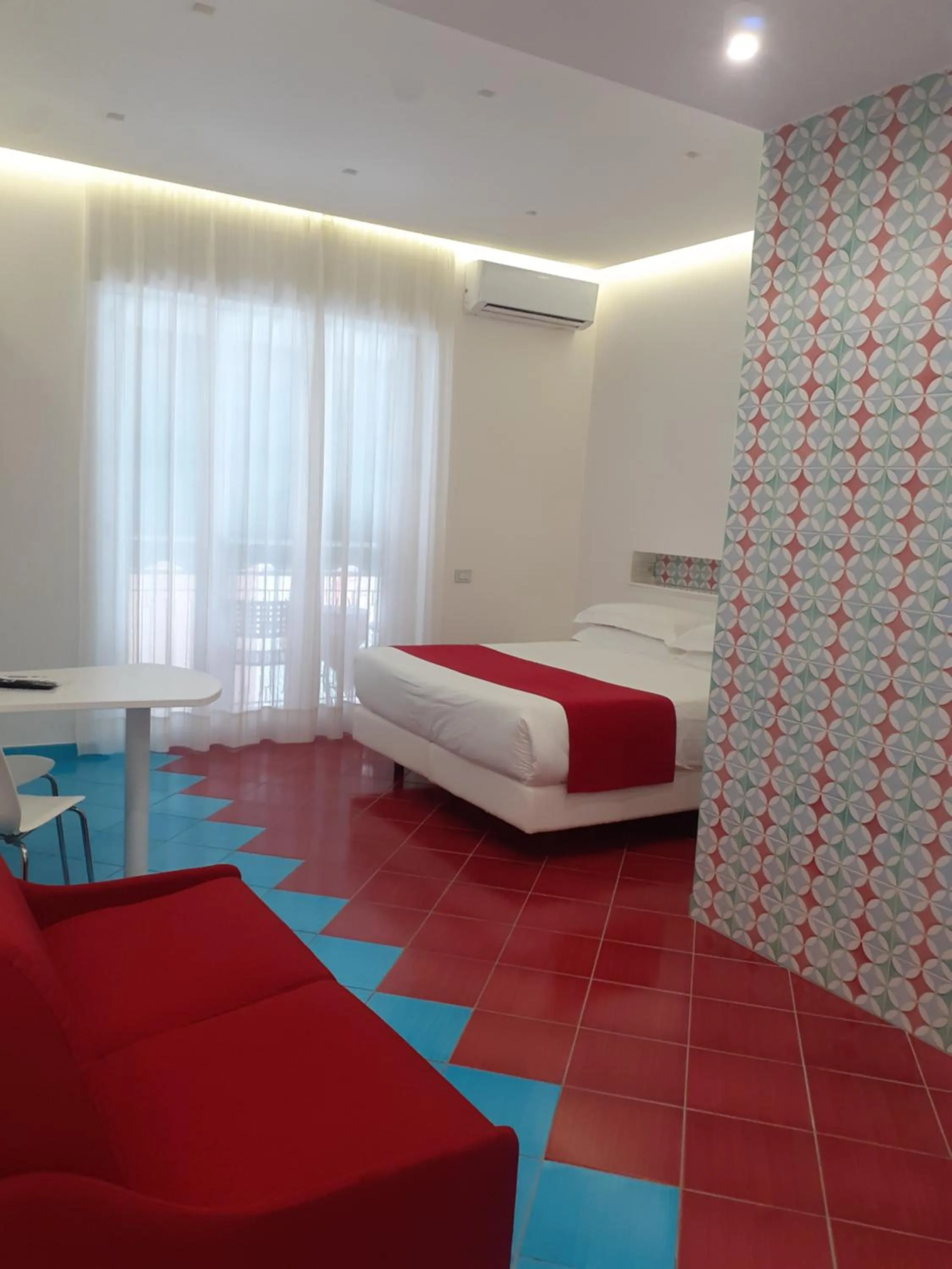 Bed in Hotel De Rosa