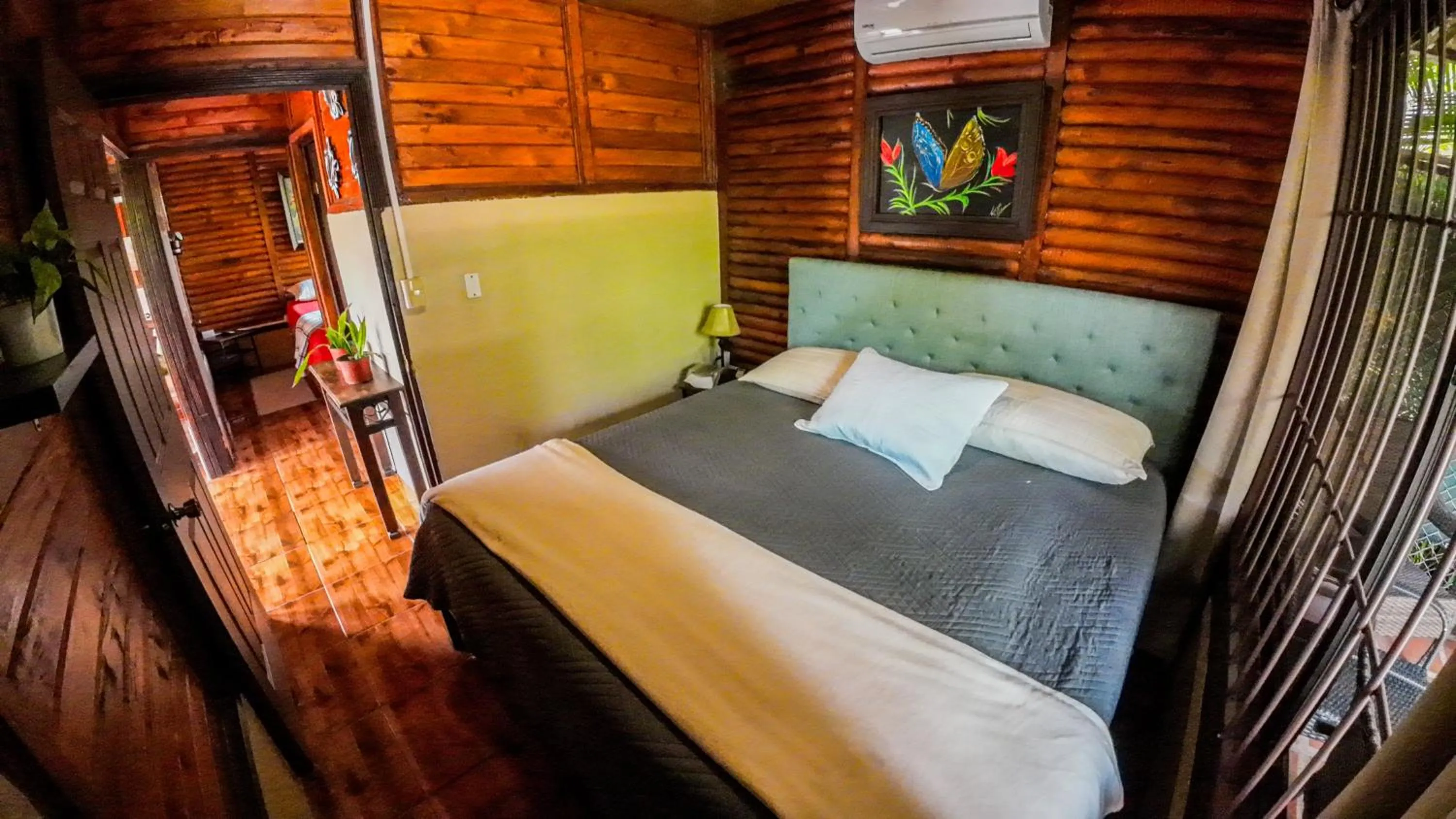 Bed in Bungalows Las Iguanas Arenal Volcano