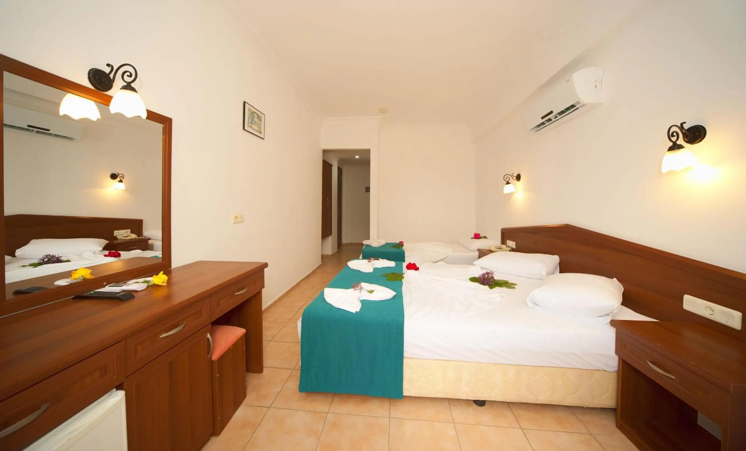 Photo of the whole room, Bed in White Hotel