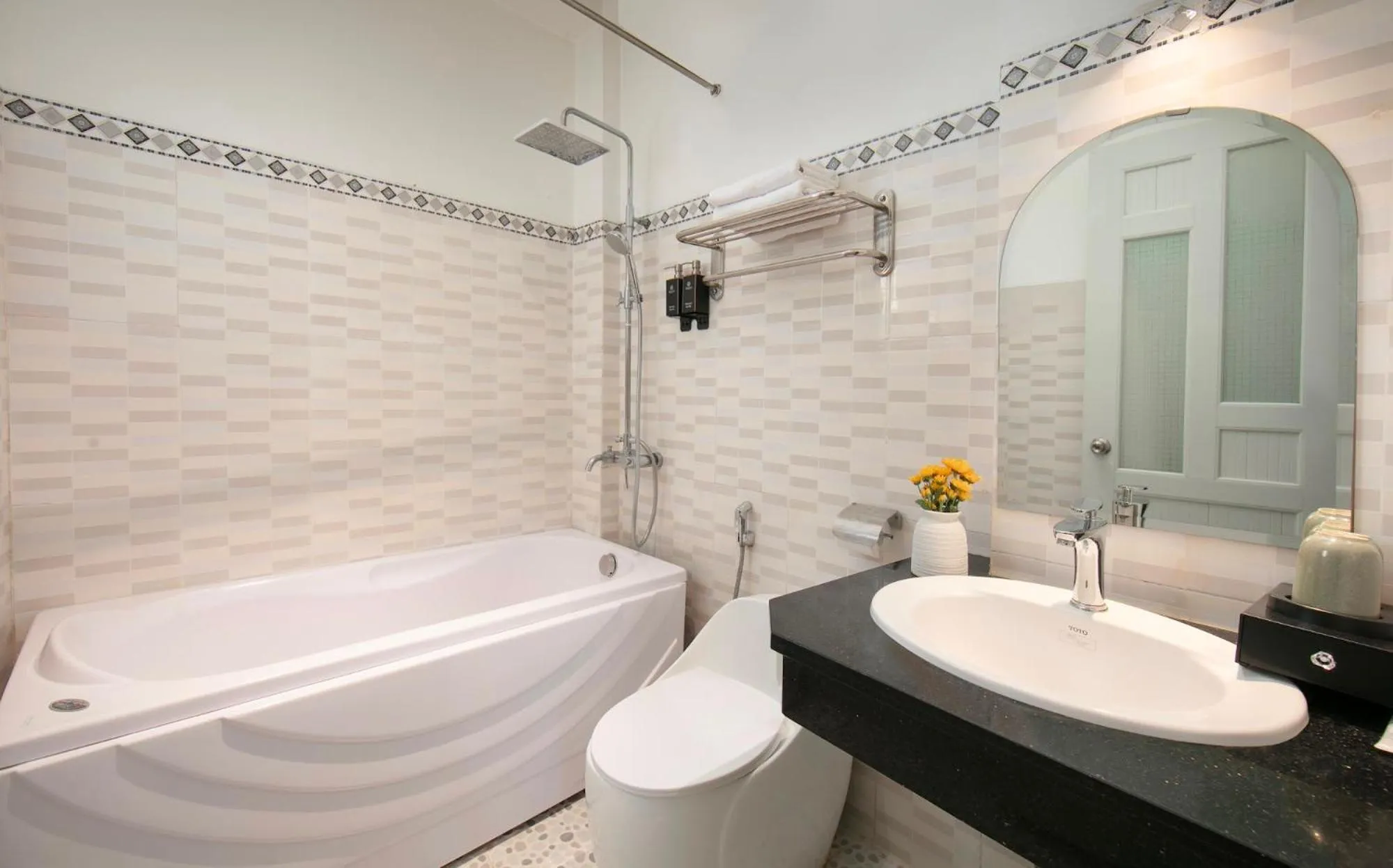 Bathroom in Delica Premium Hotel