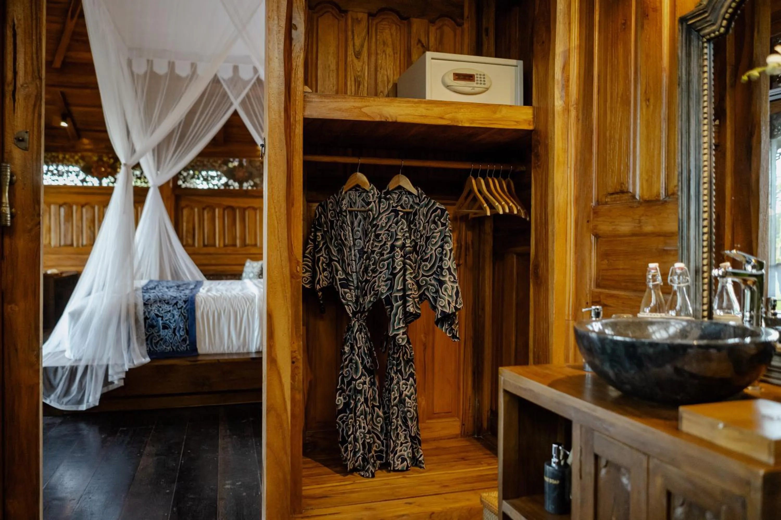 Bed in Airsania Ubud Antique Villas